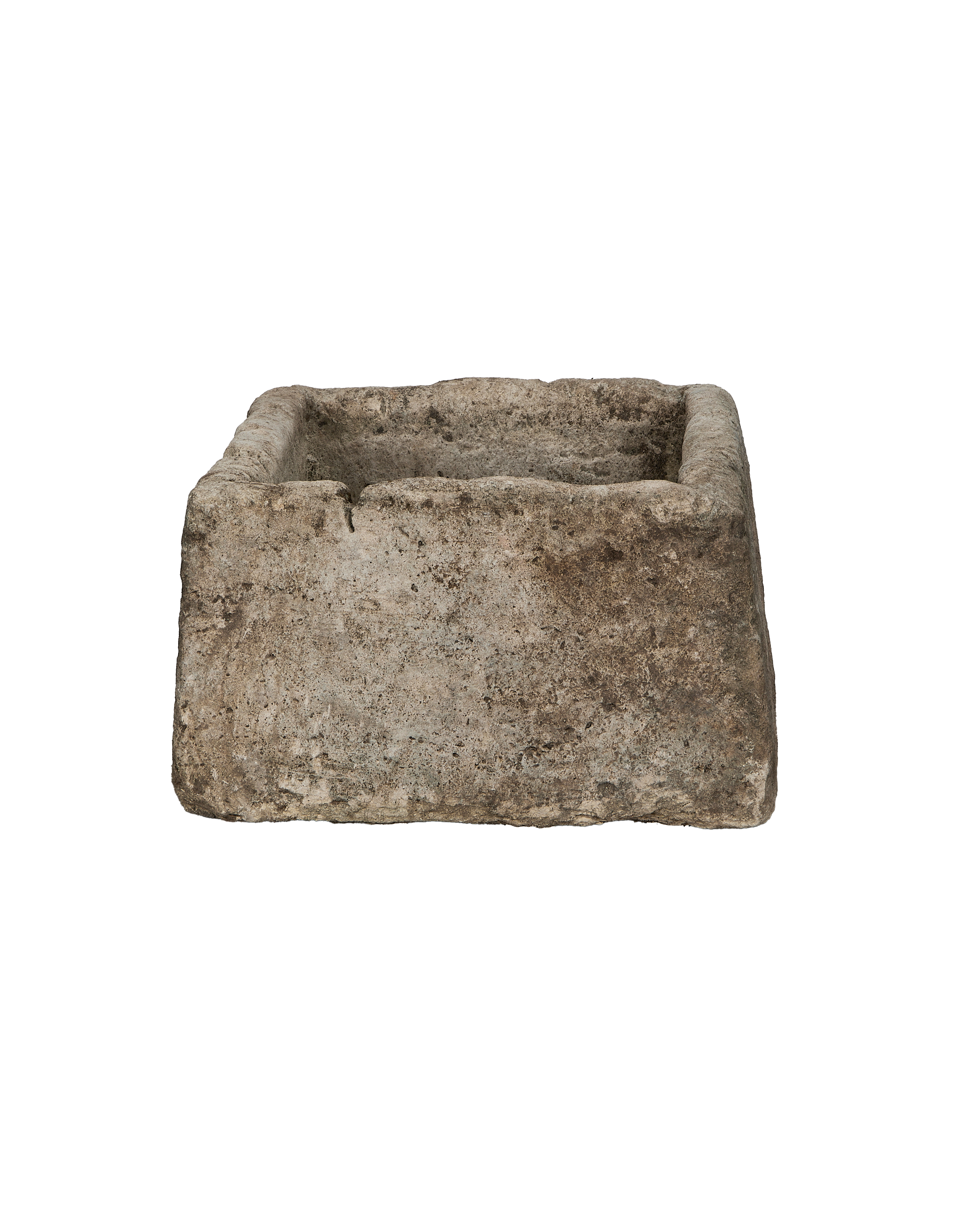 Vintage Indonesian limestone trough, rectangular, presenting the side-view showing rough, textured surface.