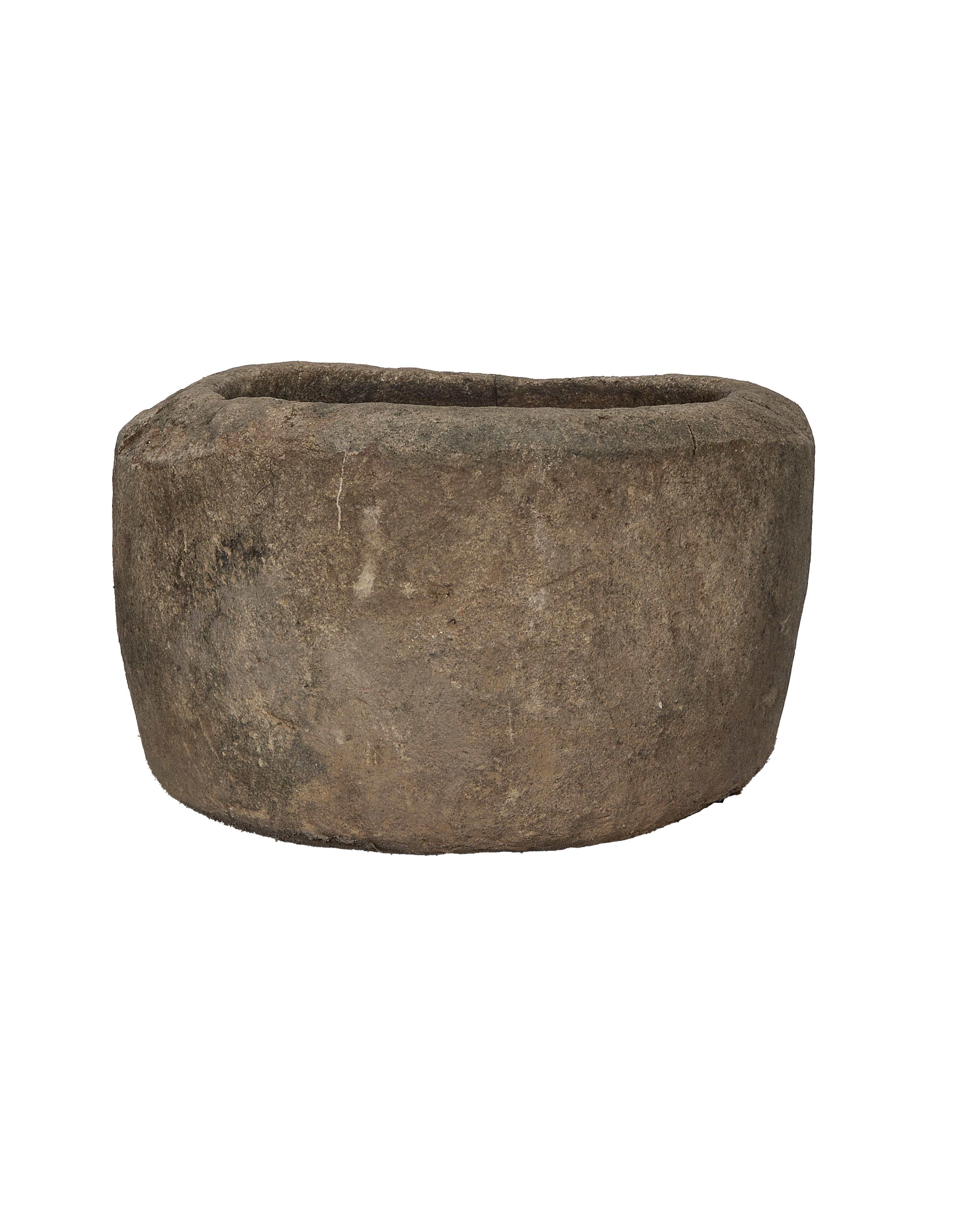 Vintage Indonesian round limestone trough, side profile showcasing textured, aged surface, and gently curved body.