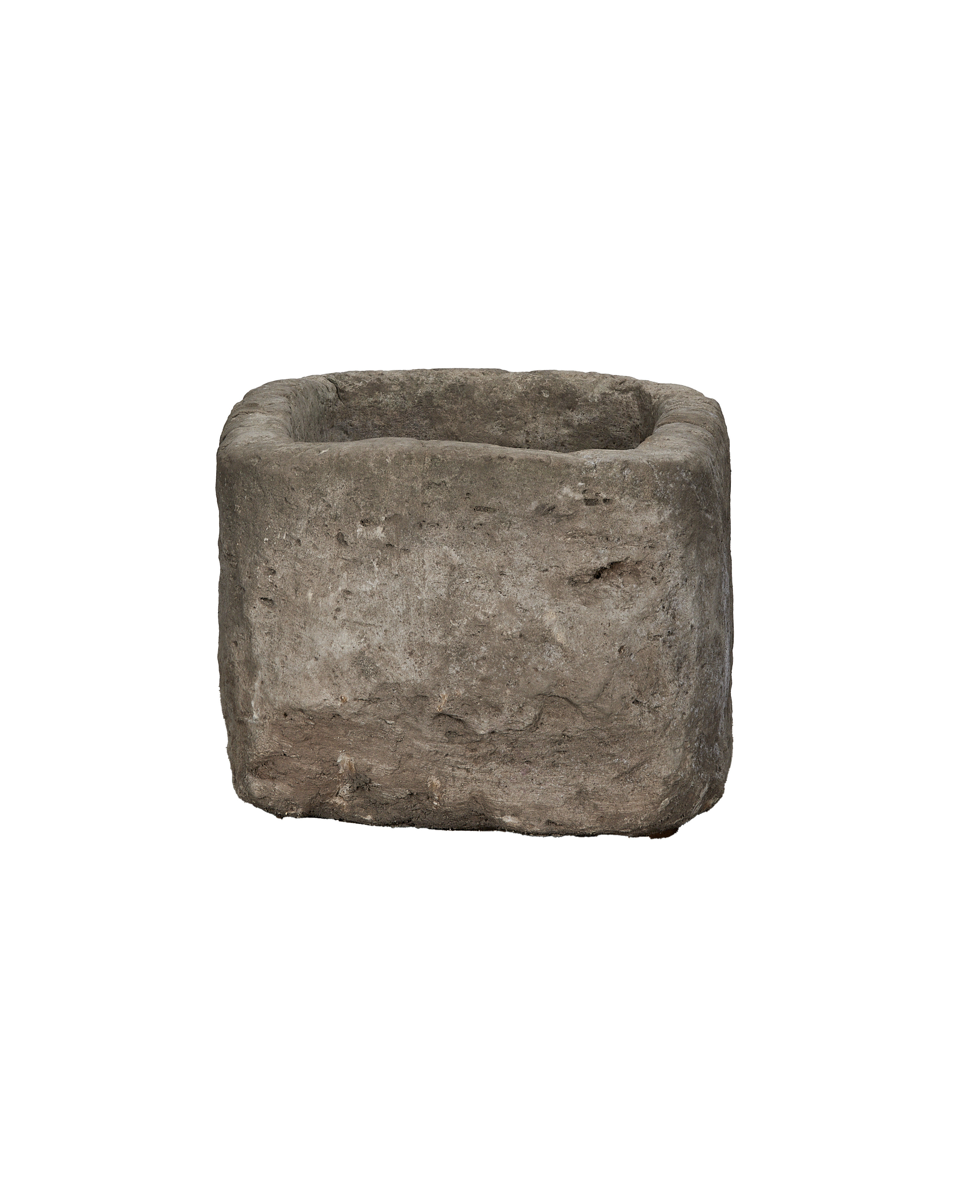 Vintage stone trough from Indonesia, weathered rectangular limestone, medium shot, showing top opening.
