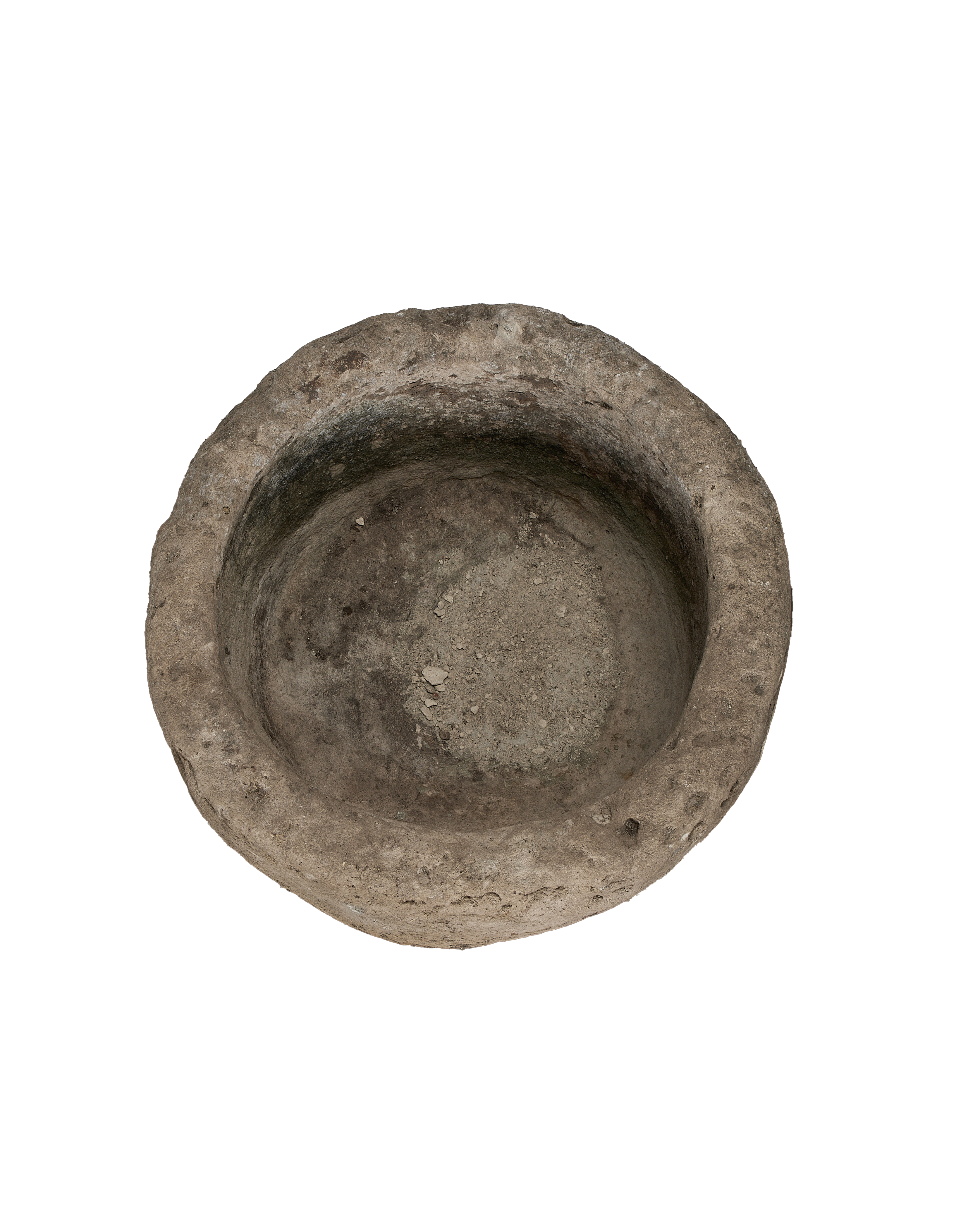 Vintage Indonesian round limestone trough, top-down view showing interior texture and depth.