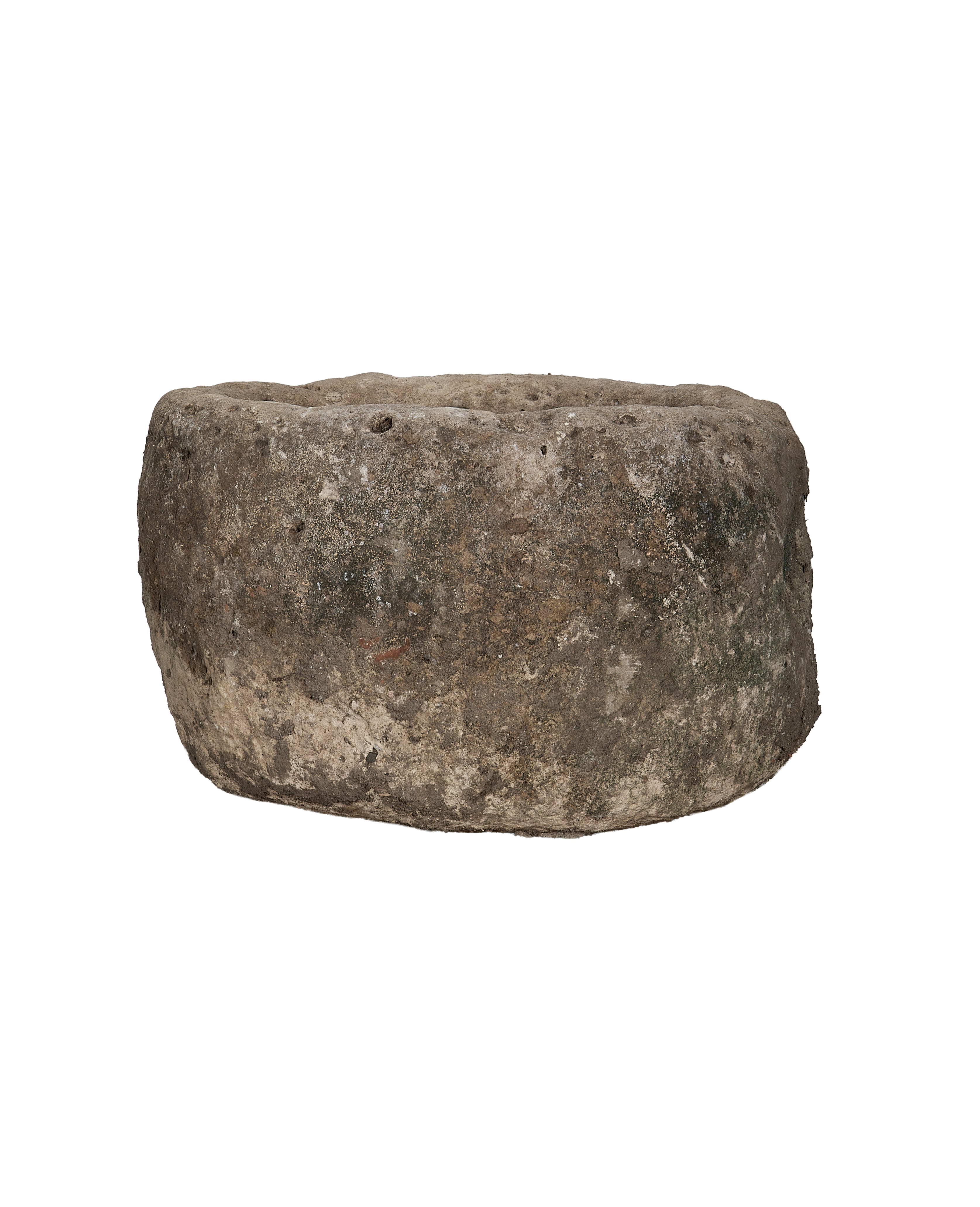 Vintage round limestone trough, aged surface texture detail, rustic Indonesian antique.