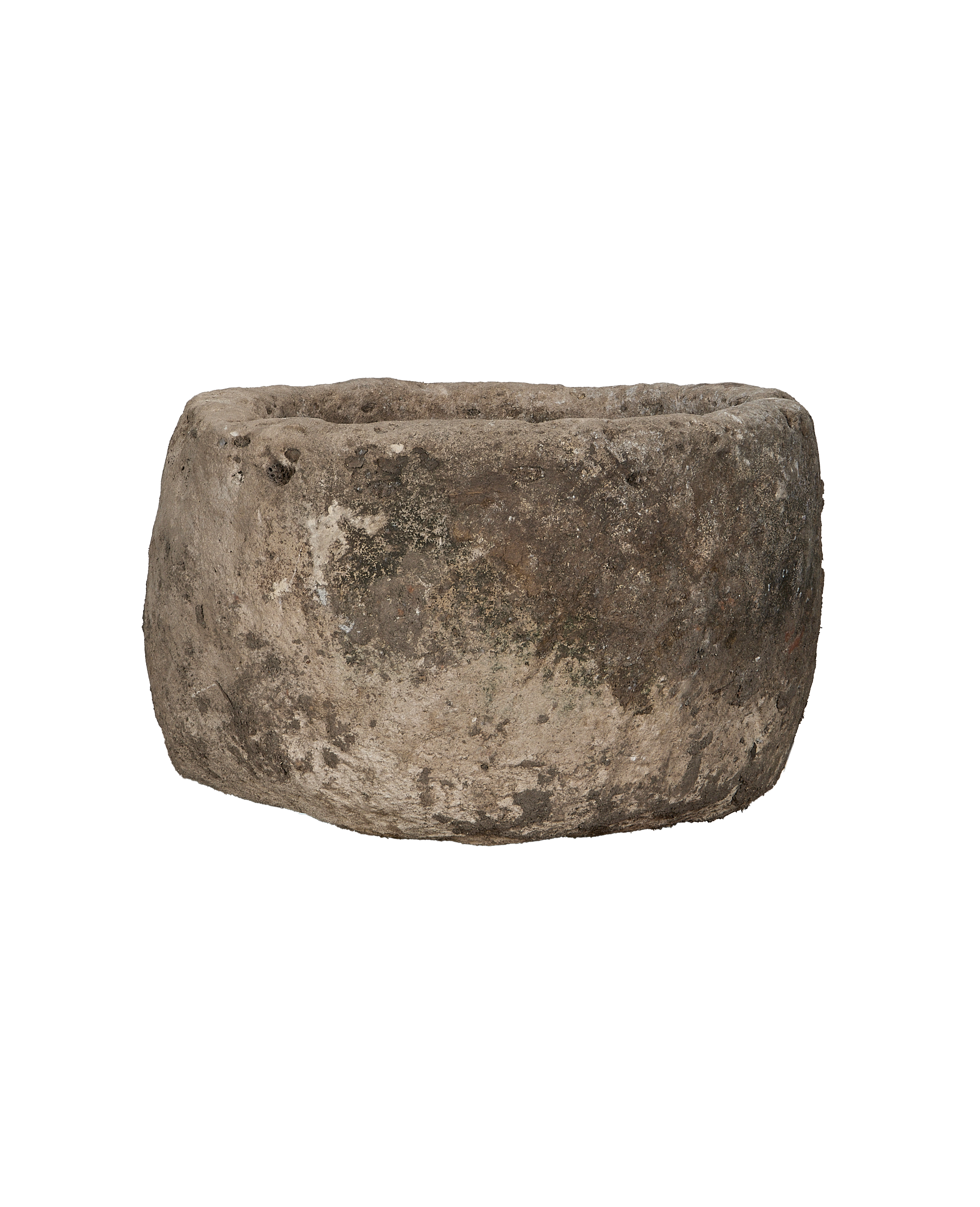 Round vintage Indonesian limestone trough, detailed side view showing rustic texture and worn condition.