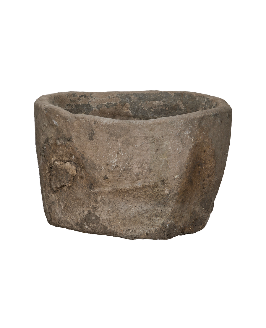 Vintage Indonesian limestone trough, OAK, with natural rough texture visible from the side.