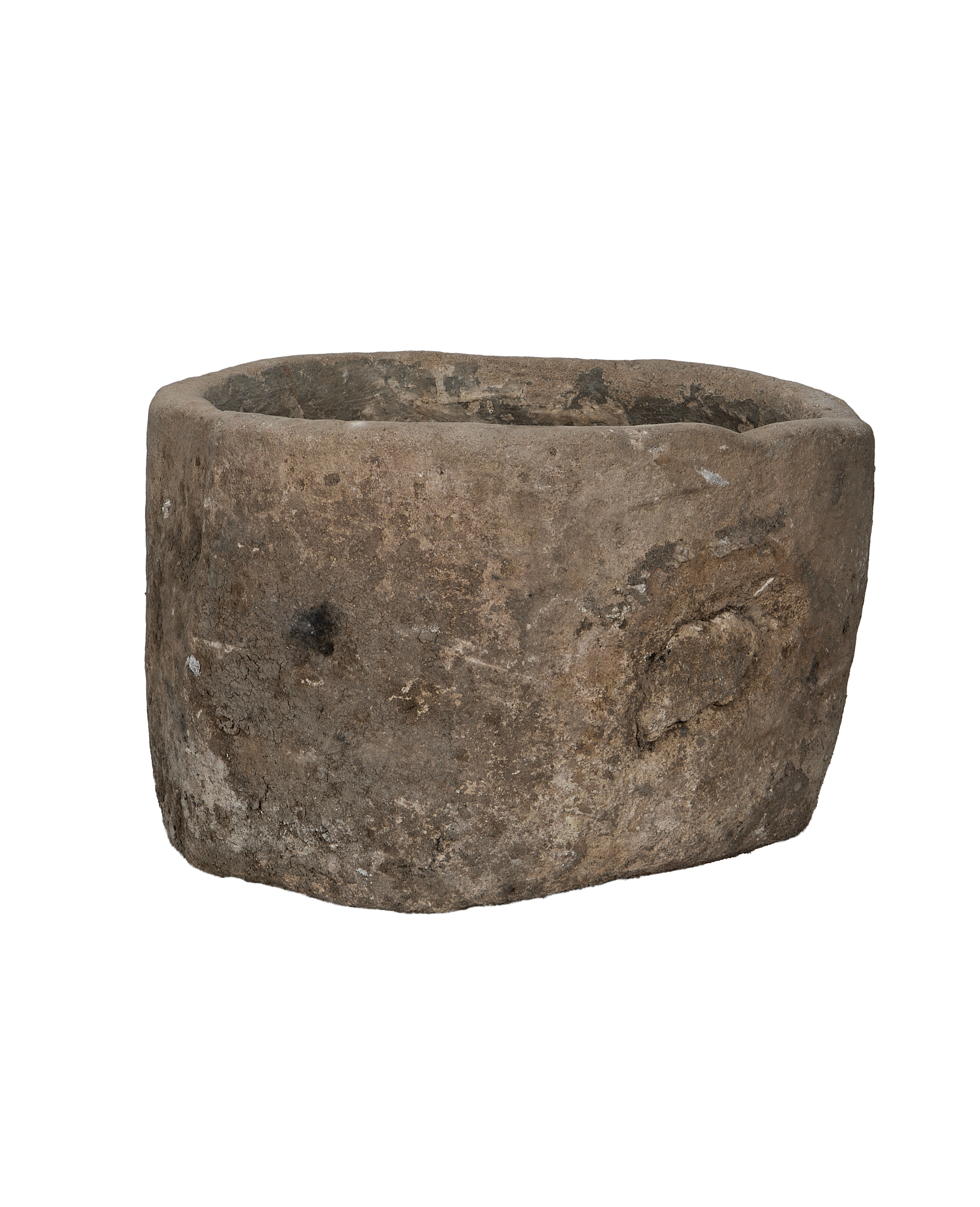 Vintage Indonesian limestone trough, showing unique aged texture and rounded interior.