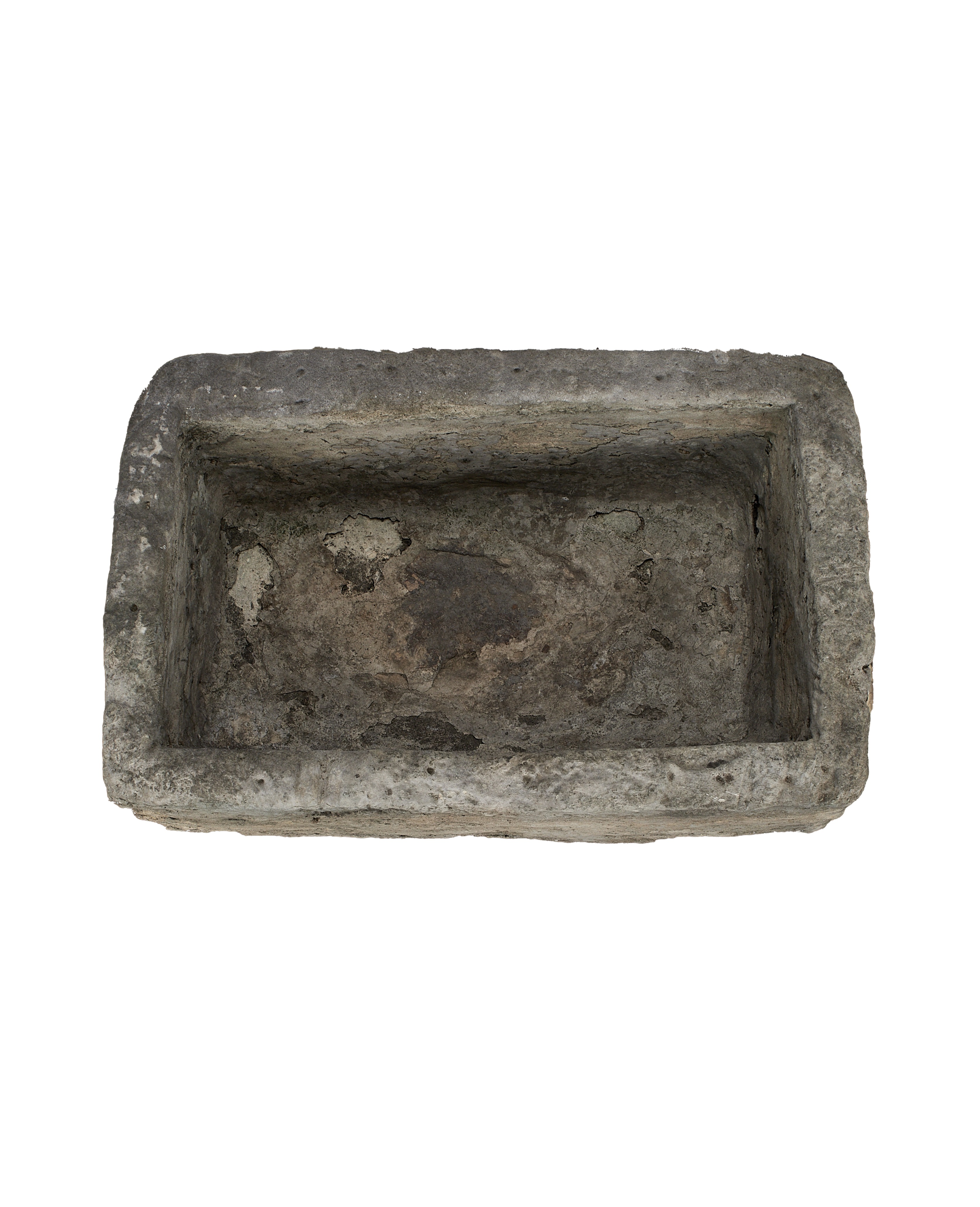 Vintage Indonesian limestone trough, top view, showing aged, textured interior.