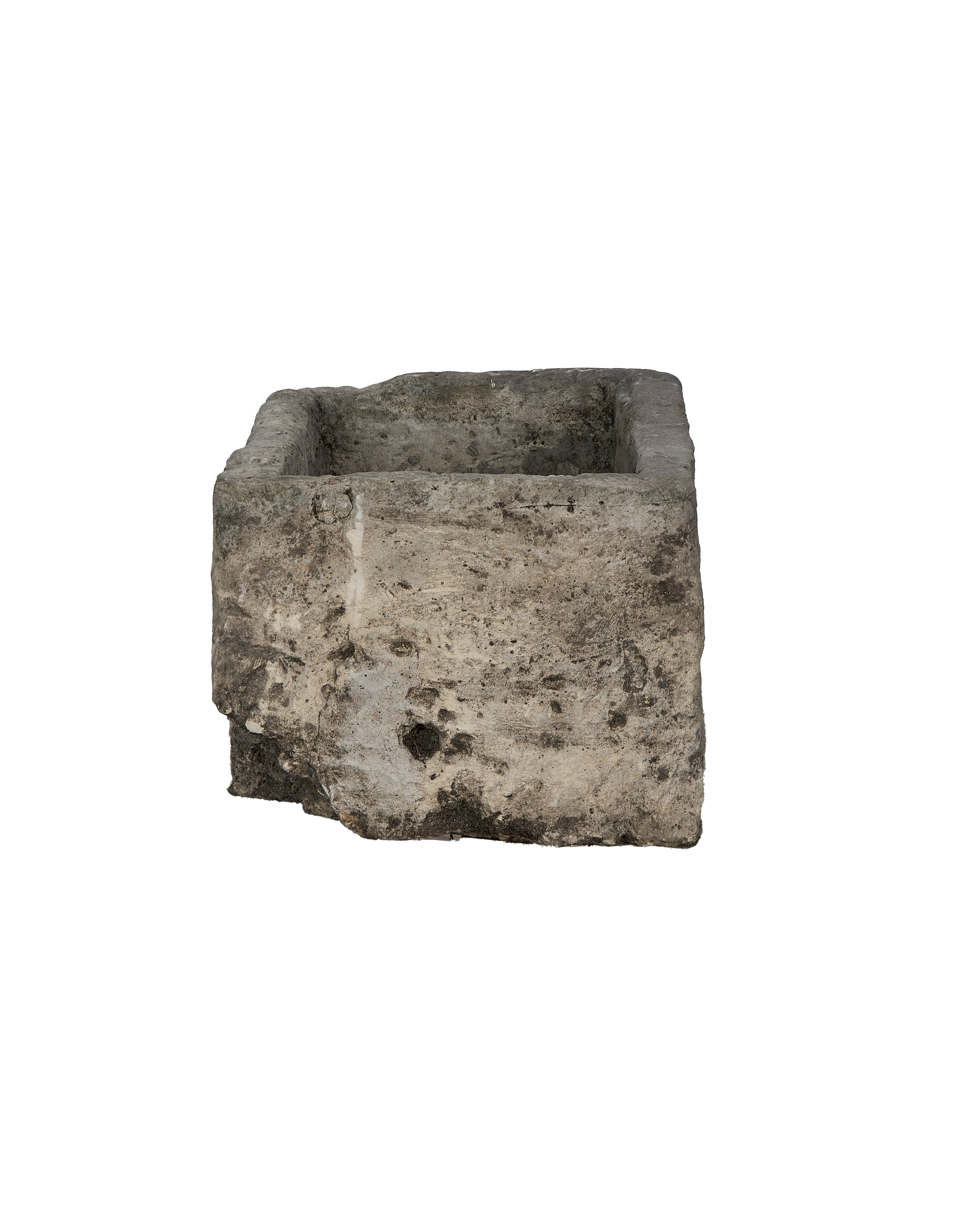 Vintage Indonesian limestone trough showing weathered, textured surface and worn edges.