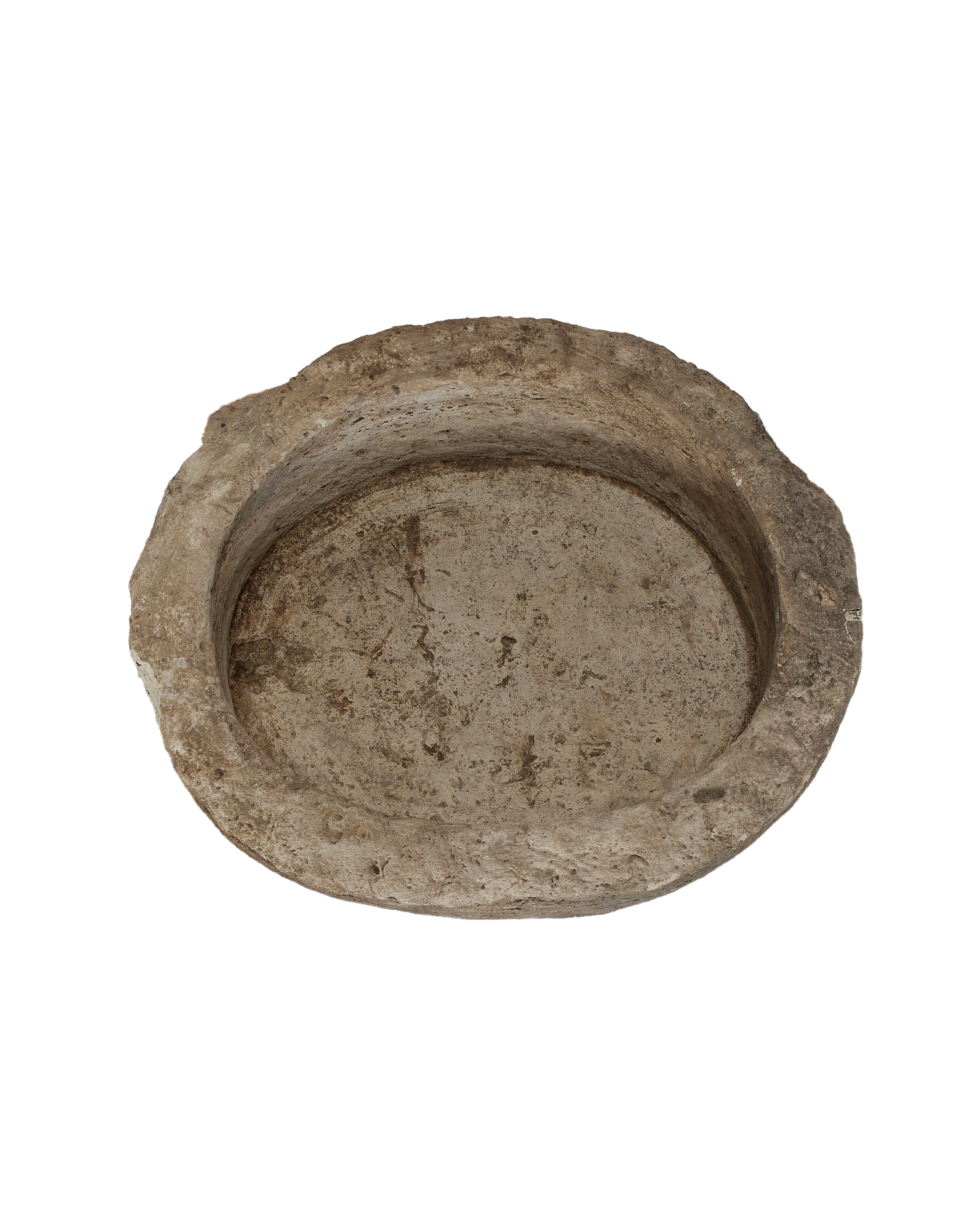 Vintage round Indonesian limestone trough, top-down view highlighting the textured, weathered interior.