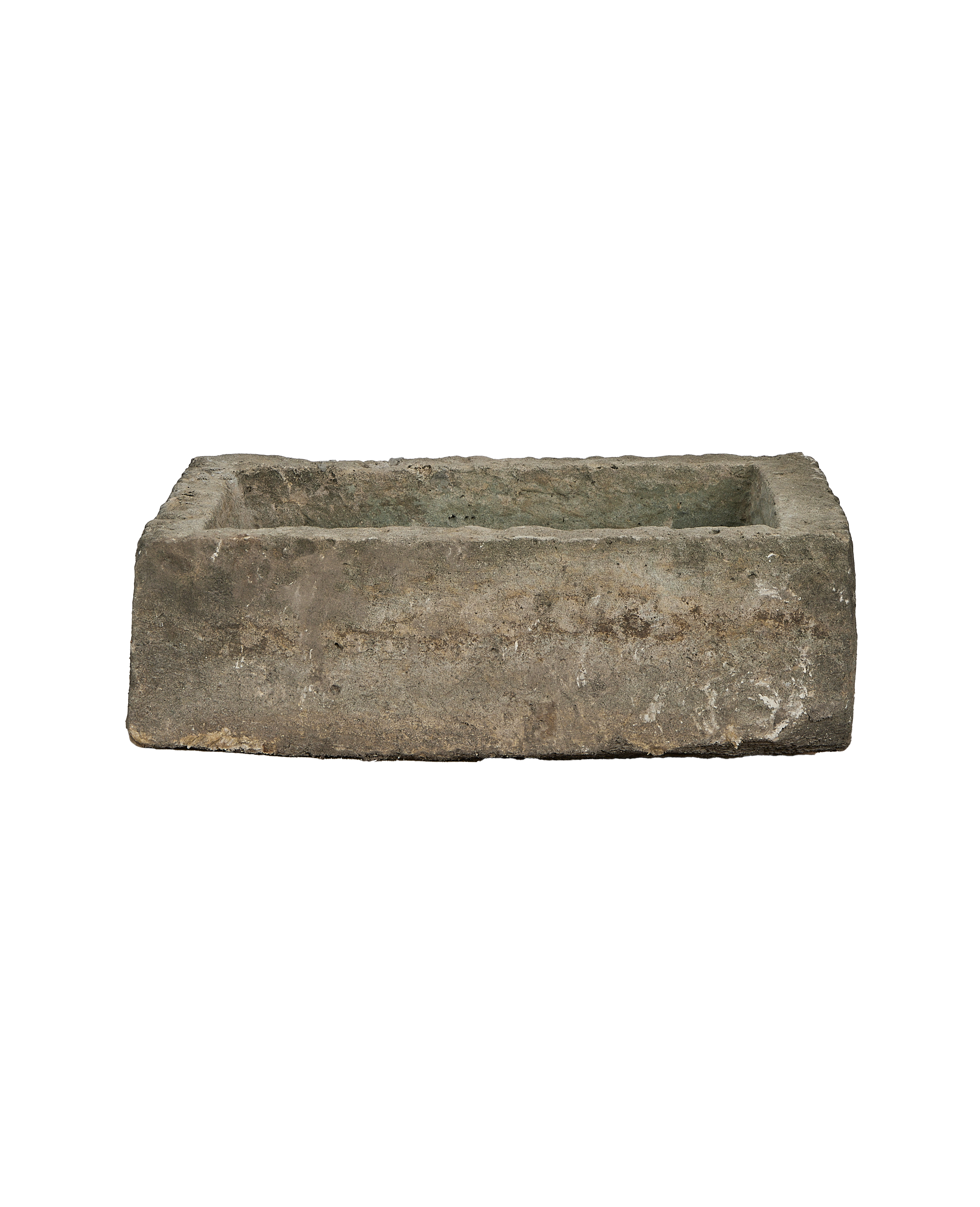 Vintage rectangular Indonesian limestone trough, showing weathered texture and interior basin from above.