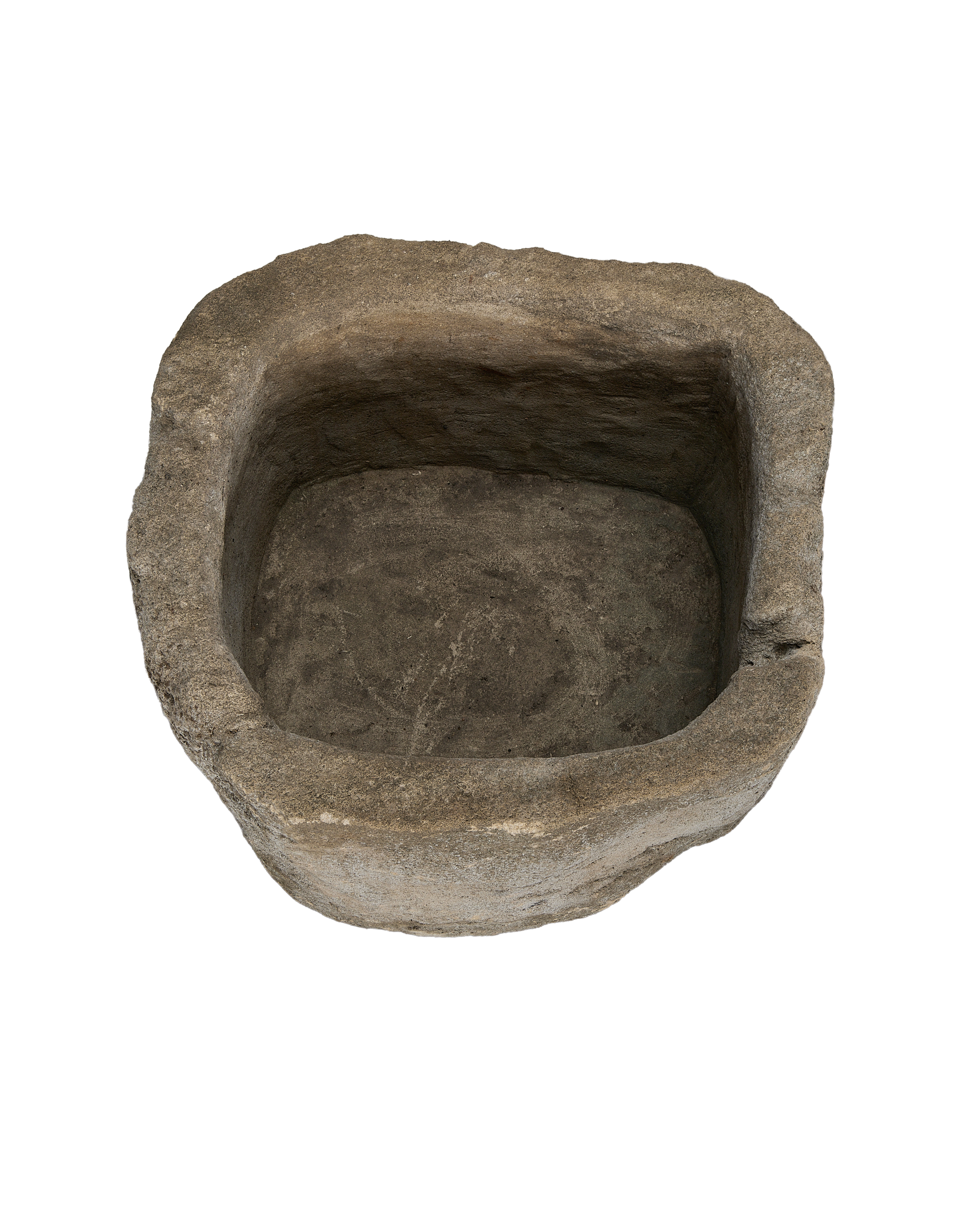 Vintage Indonesian oblong limestone trough, dark interior contrasting weathered textured rim.