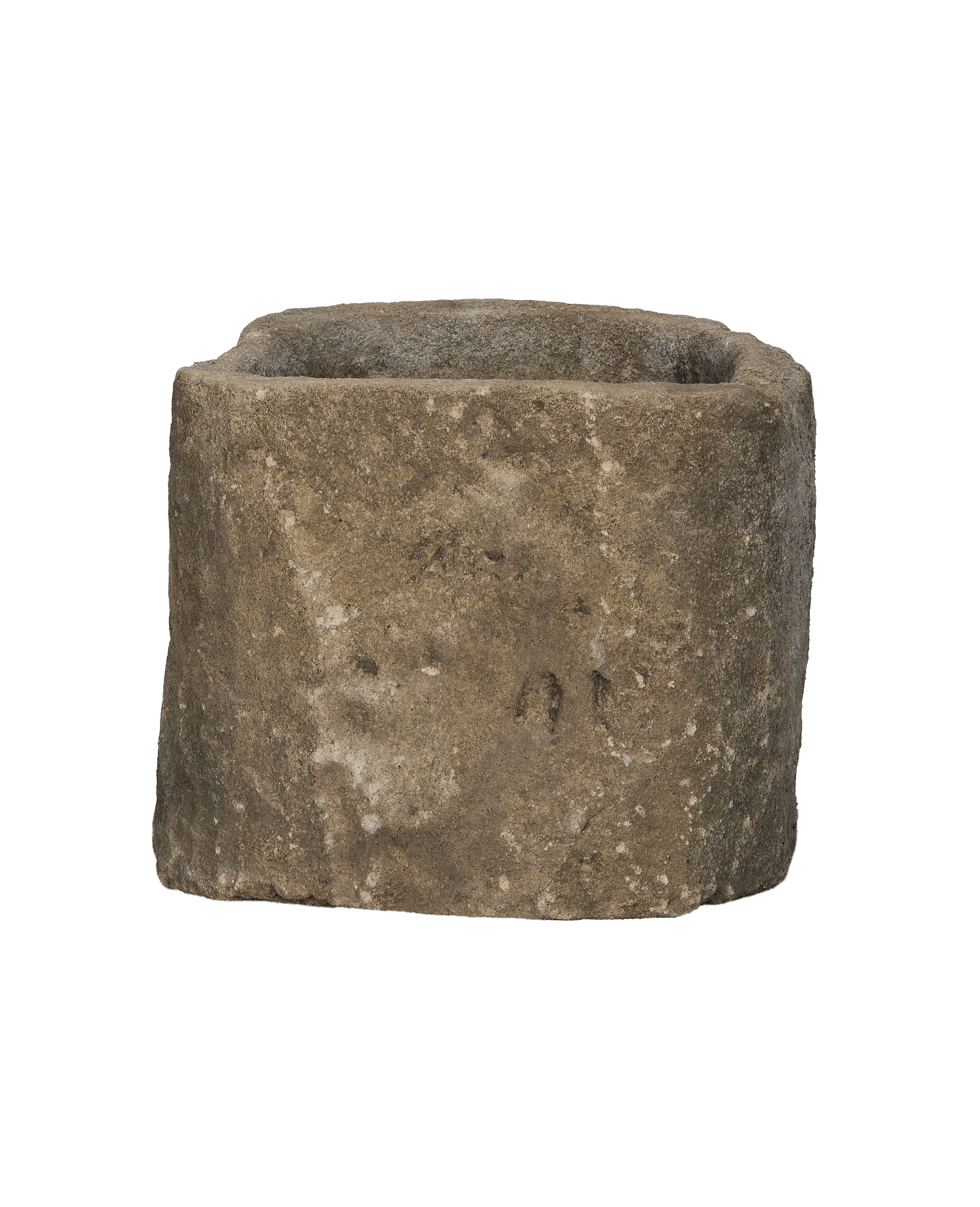 Vintage Indonesian oblong limestone trough, showing the rough, textured surface with weathered details.