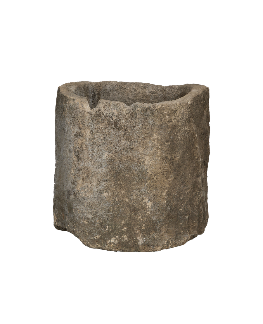 Vintage Indonesian oblong limestone trough, showing weathered texture from an elevated angle.