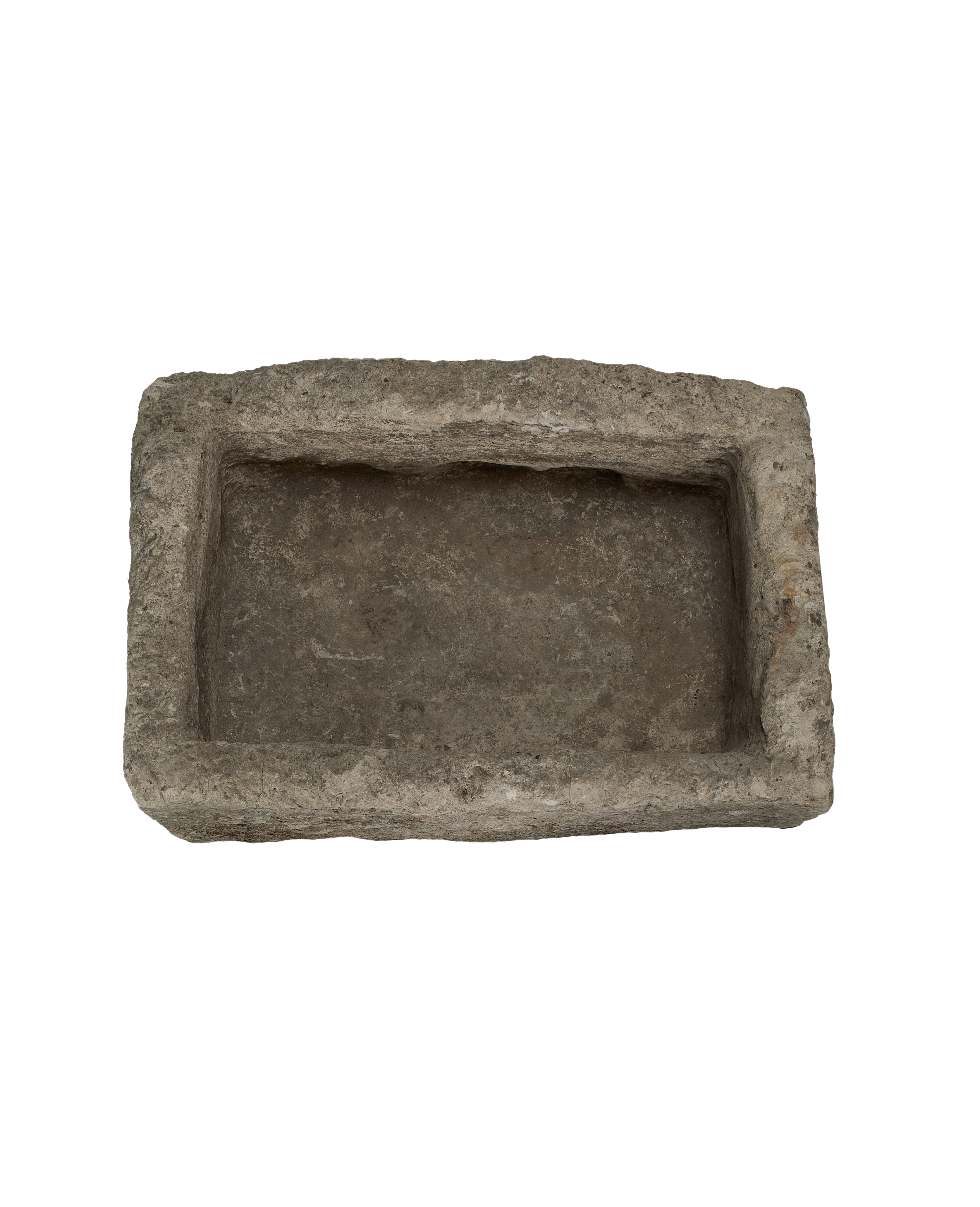 Vintage rectangular limestone trough, showing the rough, weathered interior surface from above.