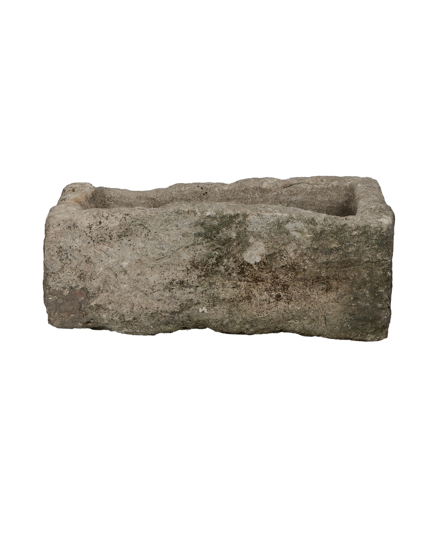 Vintage Indonesian limestone trough, rectangular, rough texture with subtle moss and weathered patina.