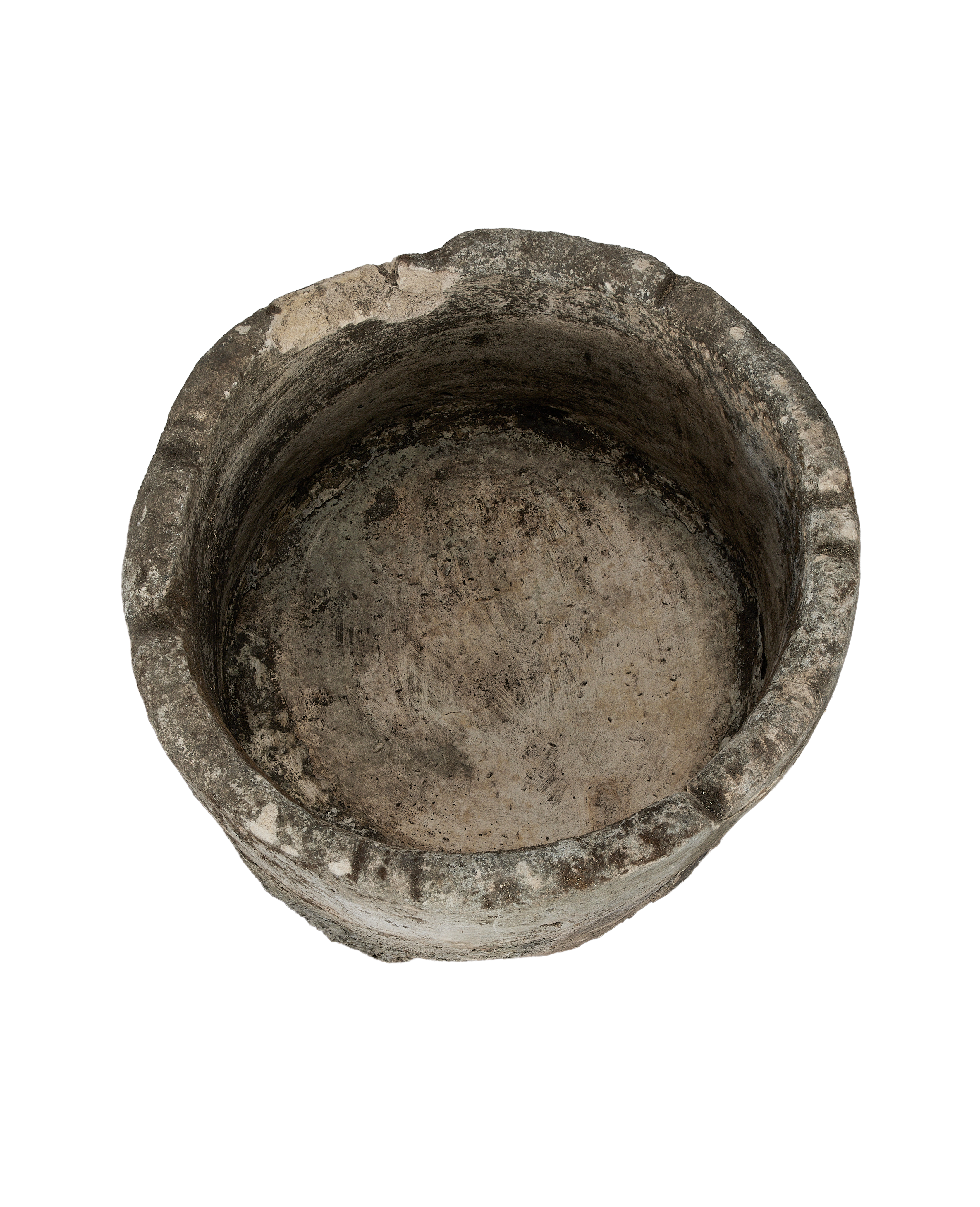 Vintage Indonesian round limestone trough, top view revealing rough interior texture and worn rim.