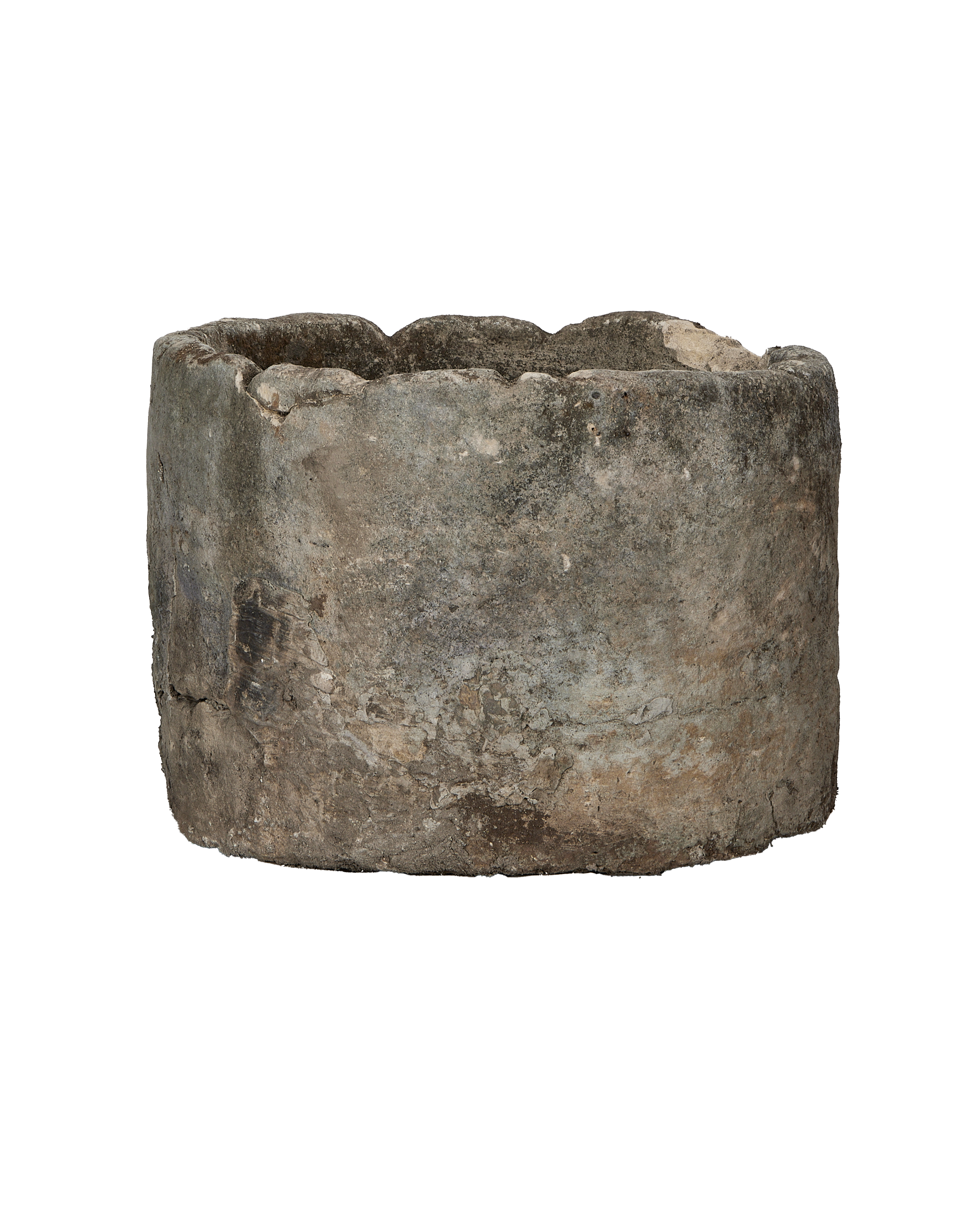 Vintage round limestone trough, Indonesia, showing rough texture, weathered patina, and organic rim detail.