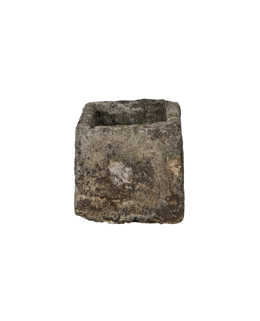 Vintage Indonesian limestone trough, top opening detail, rough textured surface, weathered condition.