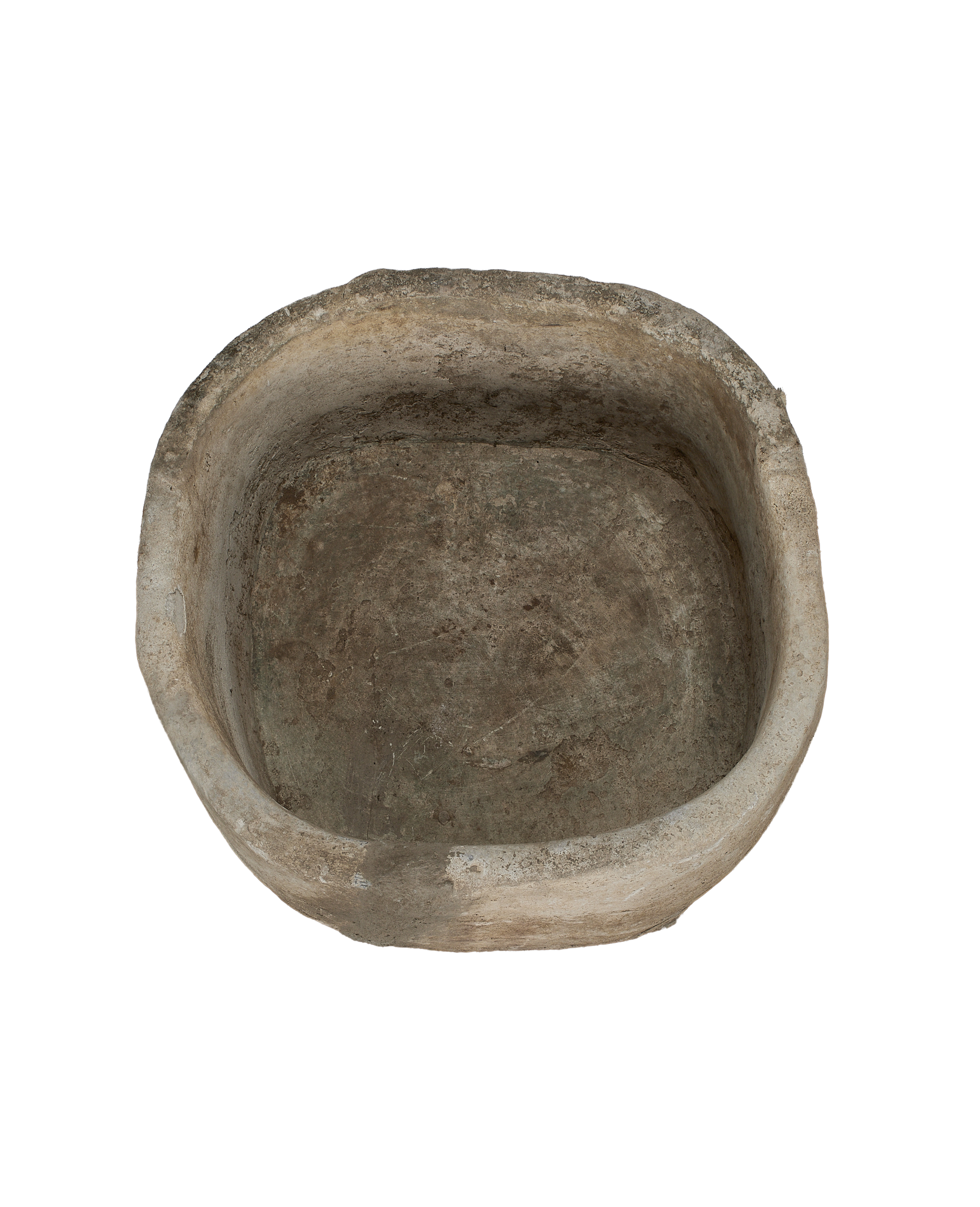 Vintage round limestone trough, top-down view showing weathered patina and rustic interior.