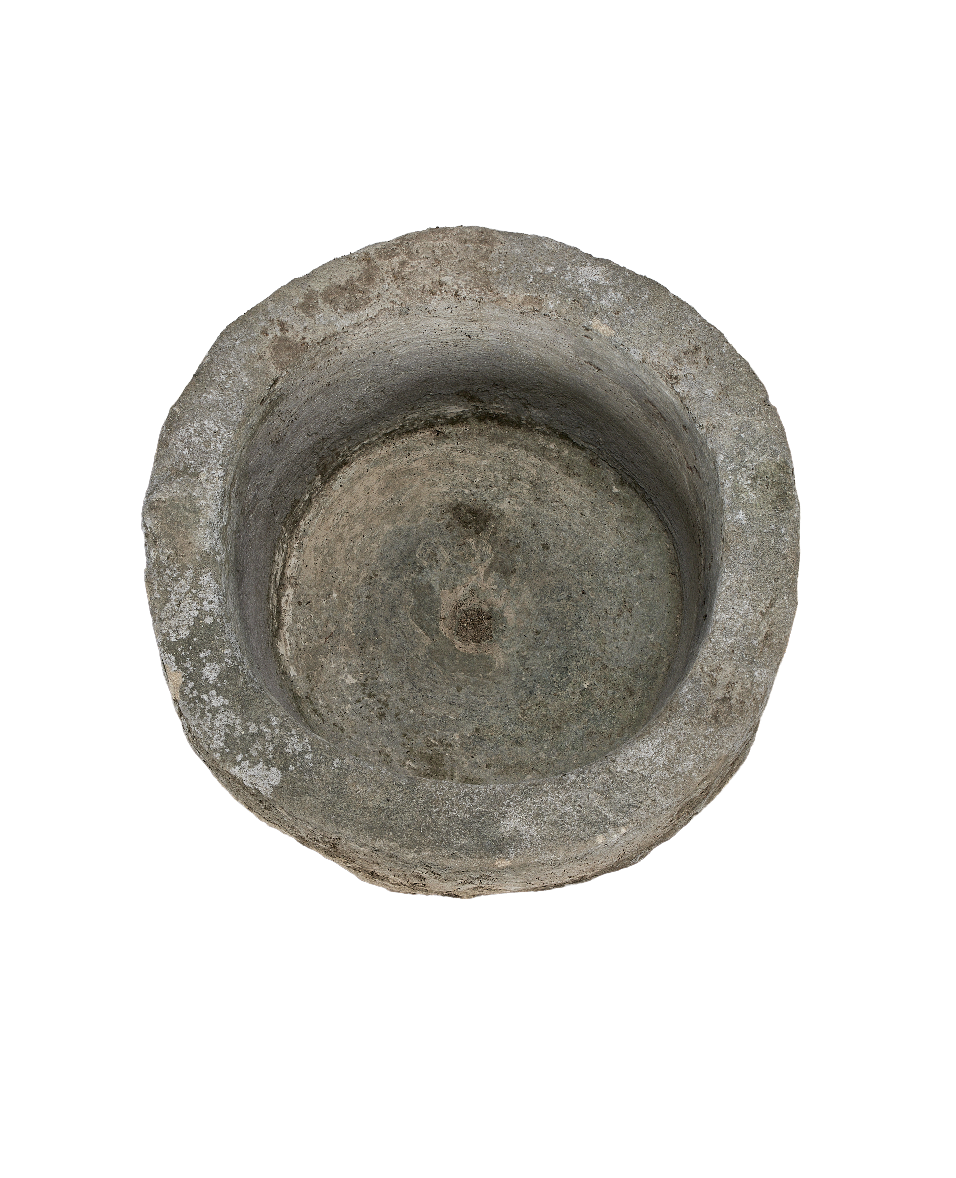Vintage Indonesian limestone round trough, top-down view showing interior basin texture.