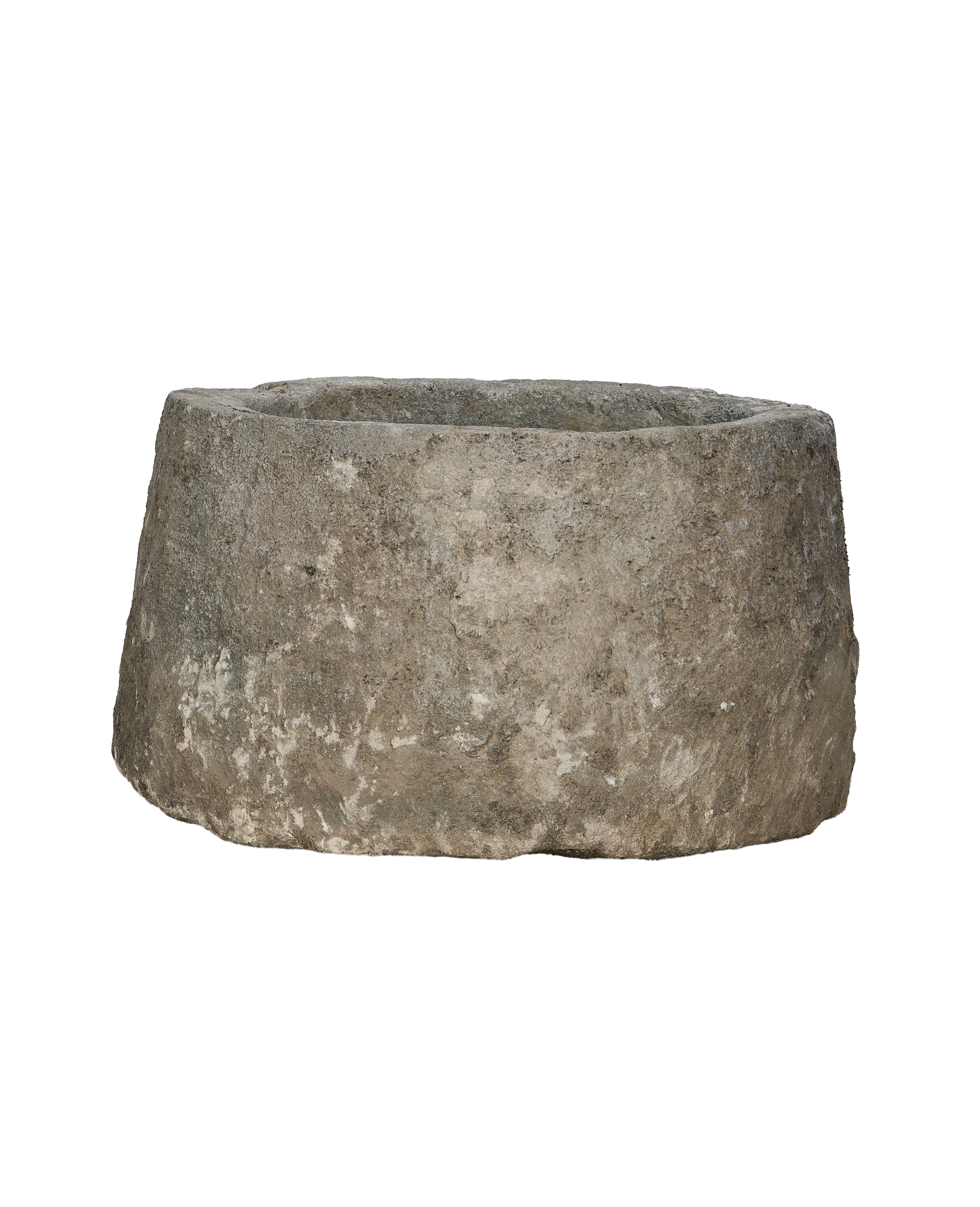 Vintage Indonesian round limestone trough, full-width close-up highlighting weathered texture.
