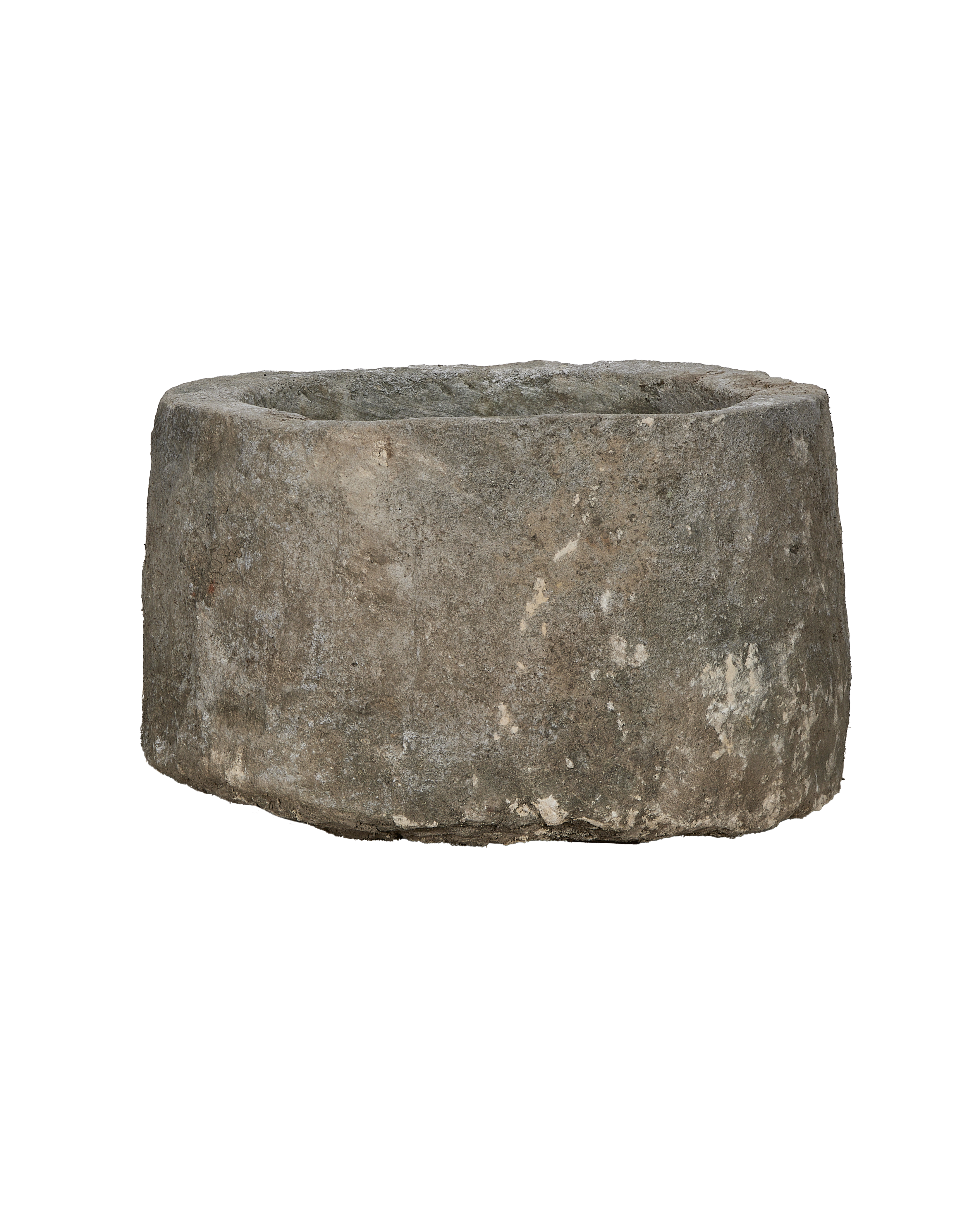 Vintage Indonesian round limestone trough, showing weathered texture and aged patina.