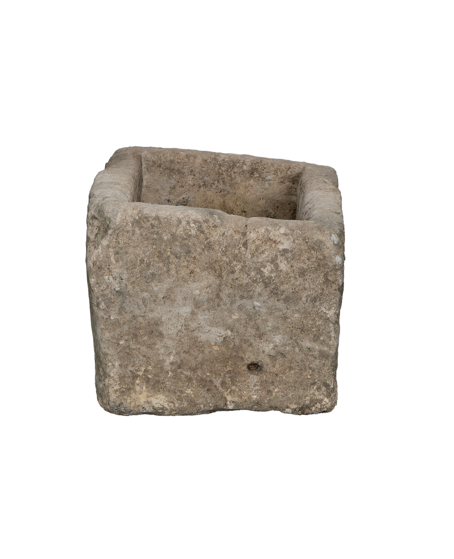 Vintage Indonesian rectangular limestone trough, visible rough exterior texture and inner basin.