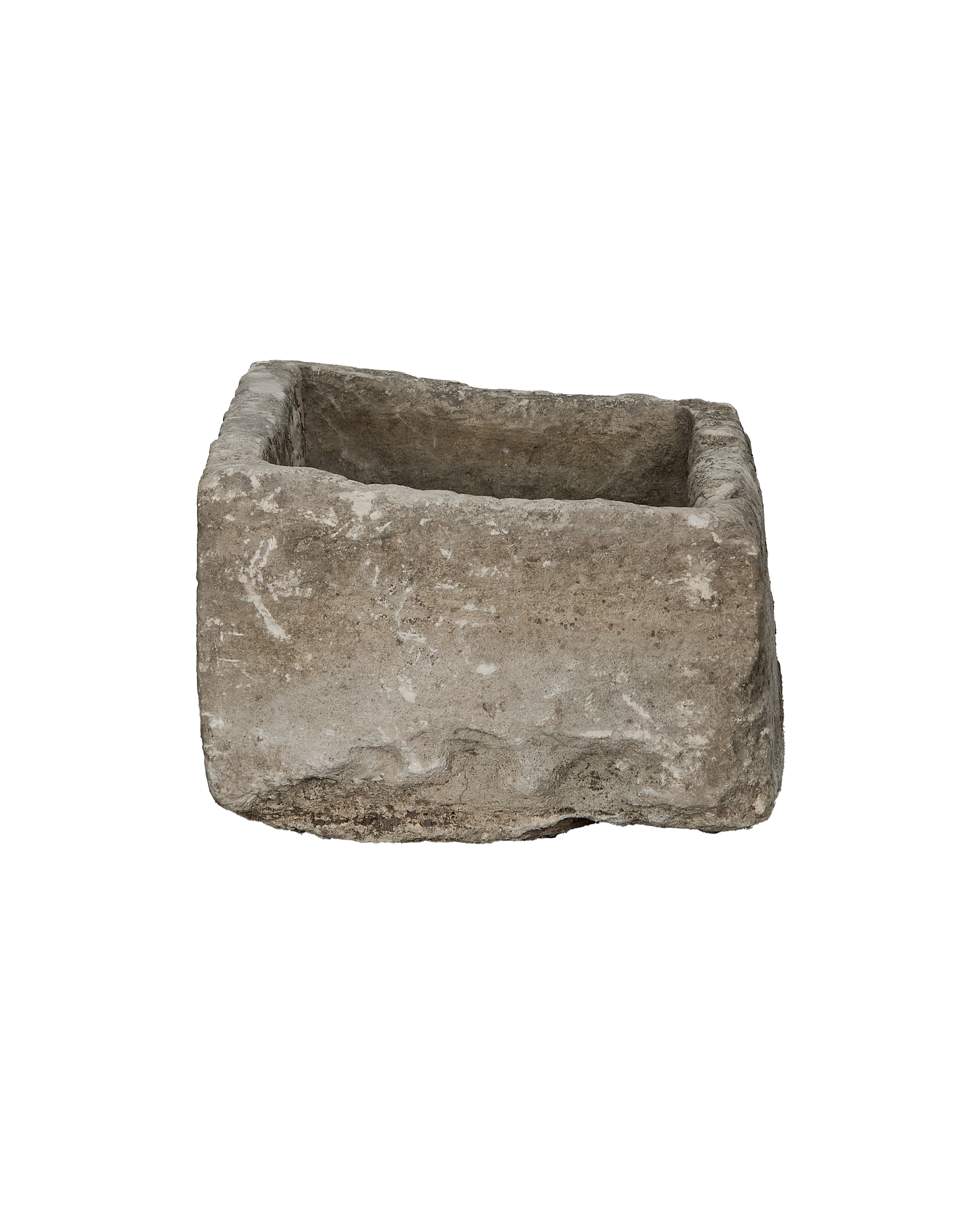 Vintage limestone rectangular trough, showing rough weathered texture and natural imperfections, from above.