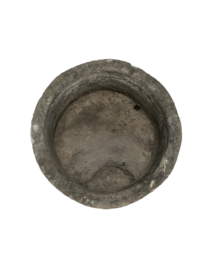 Vintage round limestone trough, Indonesia origin, showing textured interior details.