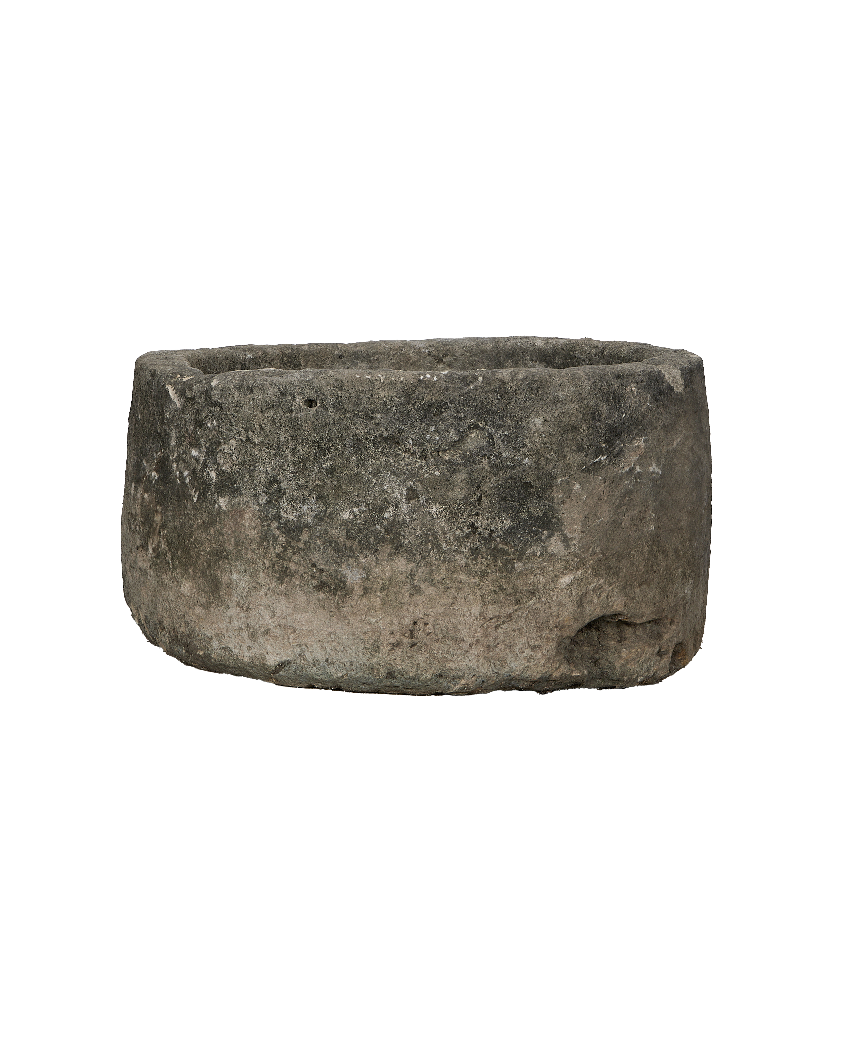 Vintage Indonesian round limestone trough, showing weathered texture and natural imperfections.