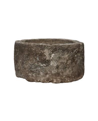 Vintage round limestone trough from Indonesia, weathered with natural rough texture.
