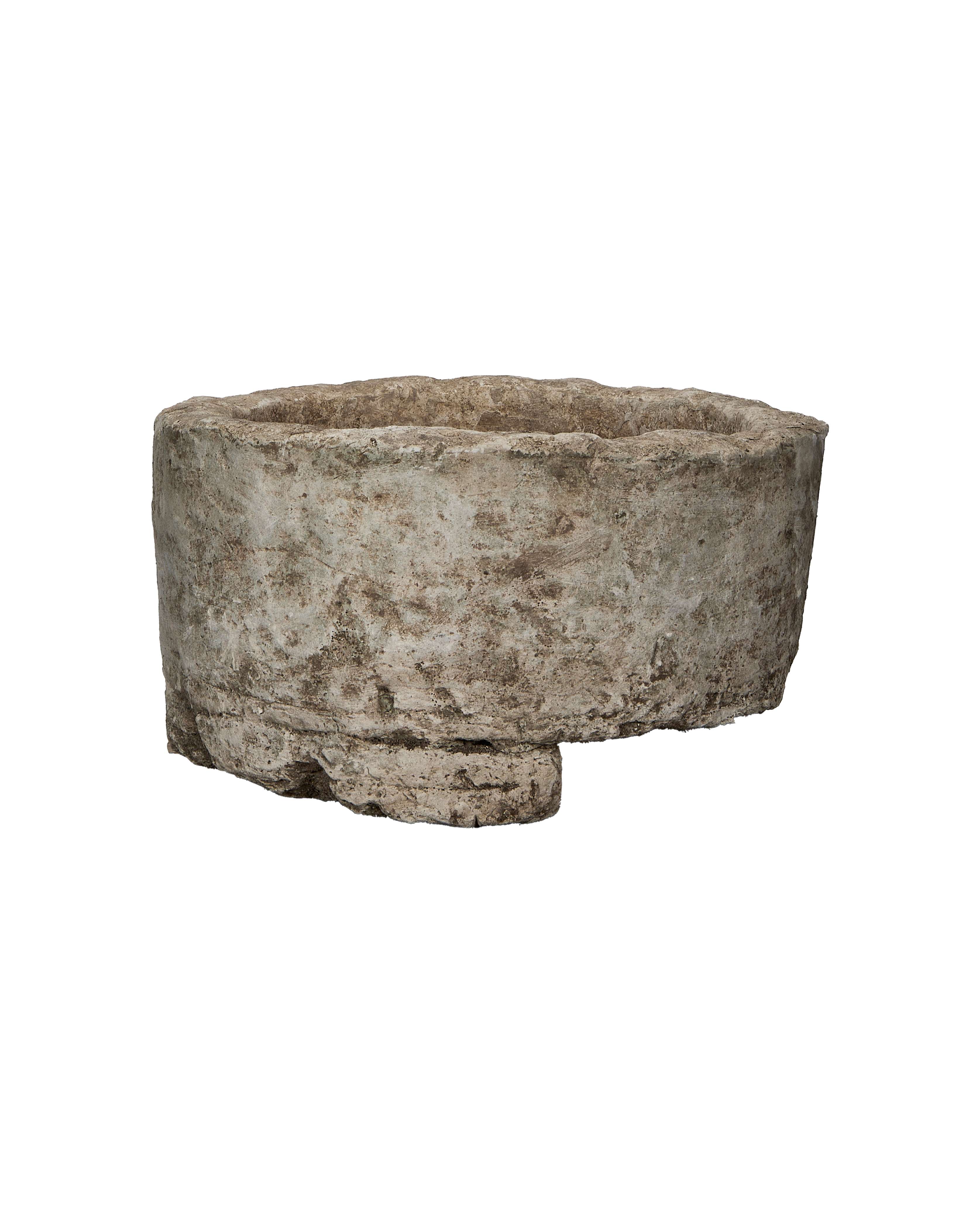 Vintage Indonesian round limestone trough, showing a cracked, weathered base and rough-hewn texture.