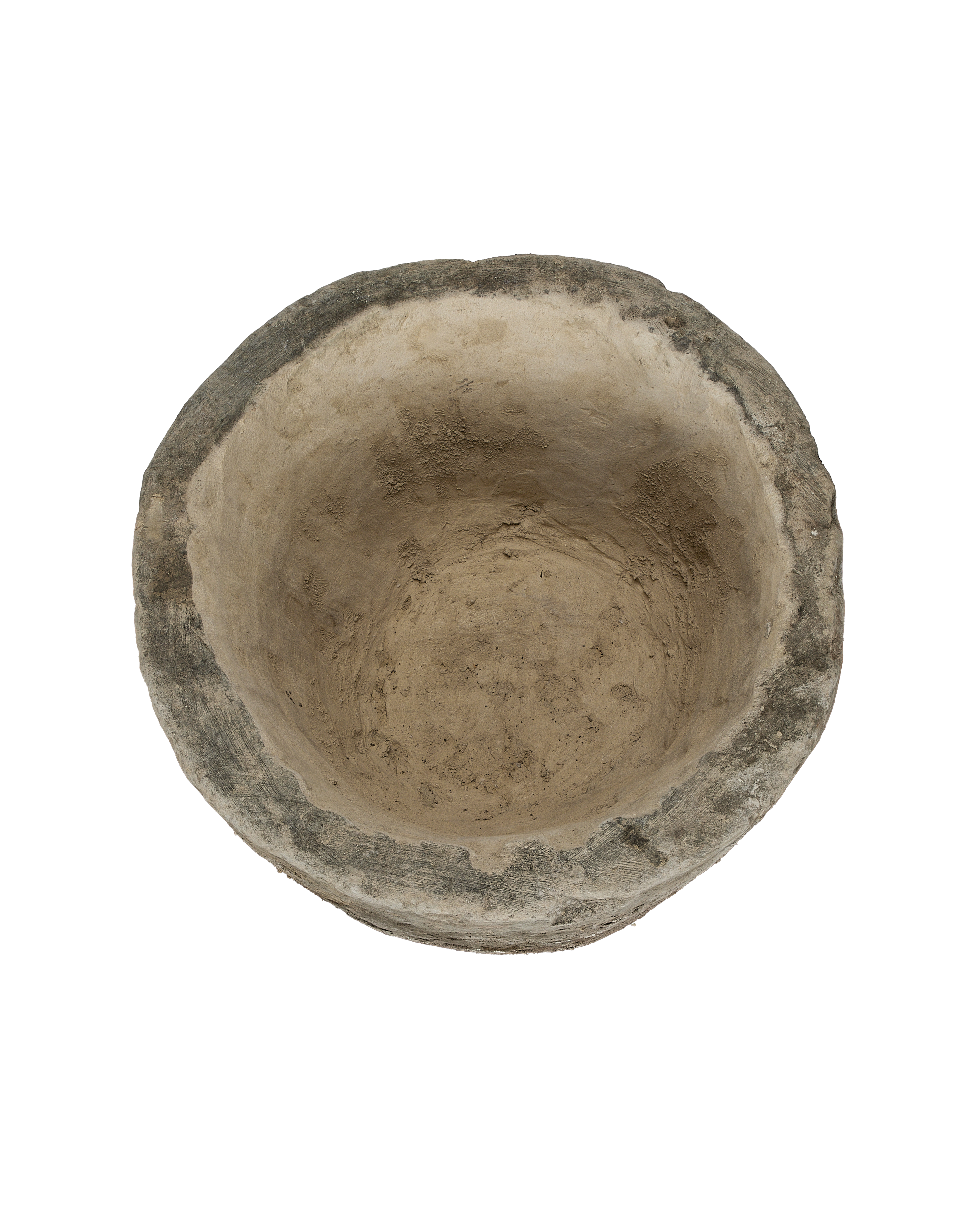 Vintage Indonesian round limestone trough, top-down view showing weathered gray rim.
