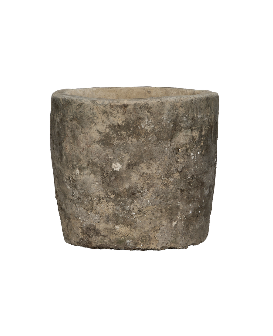 Vintage round Indonesian limestone trough, detailed side view showing rustic texture and weathered patina.