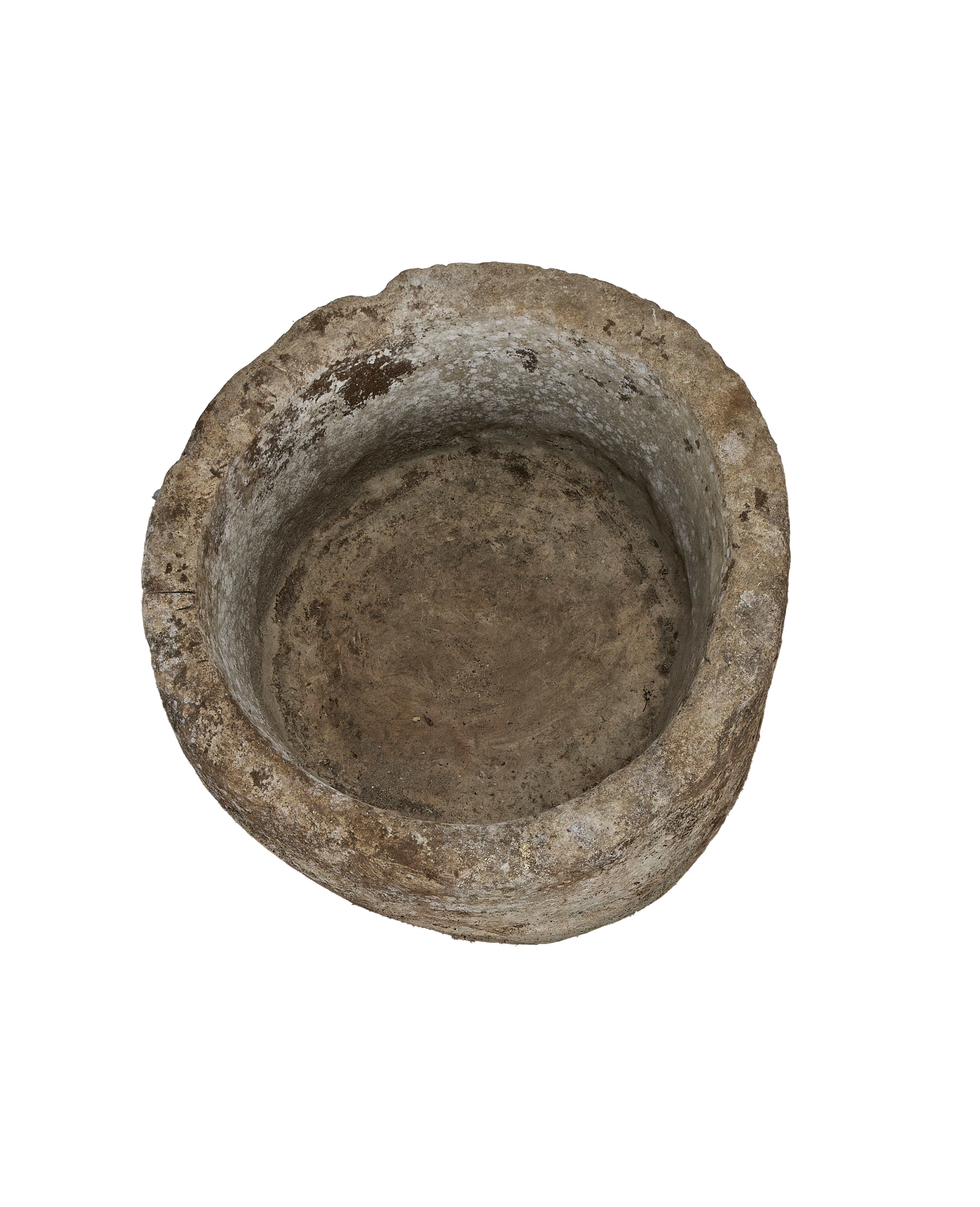 Vintage Indonesian round limestone trough, top view highlights weathered interior texture and age.