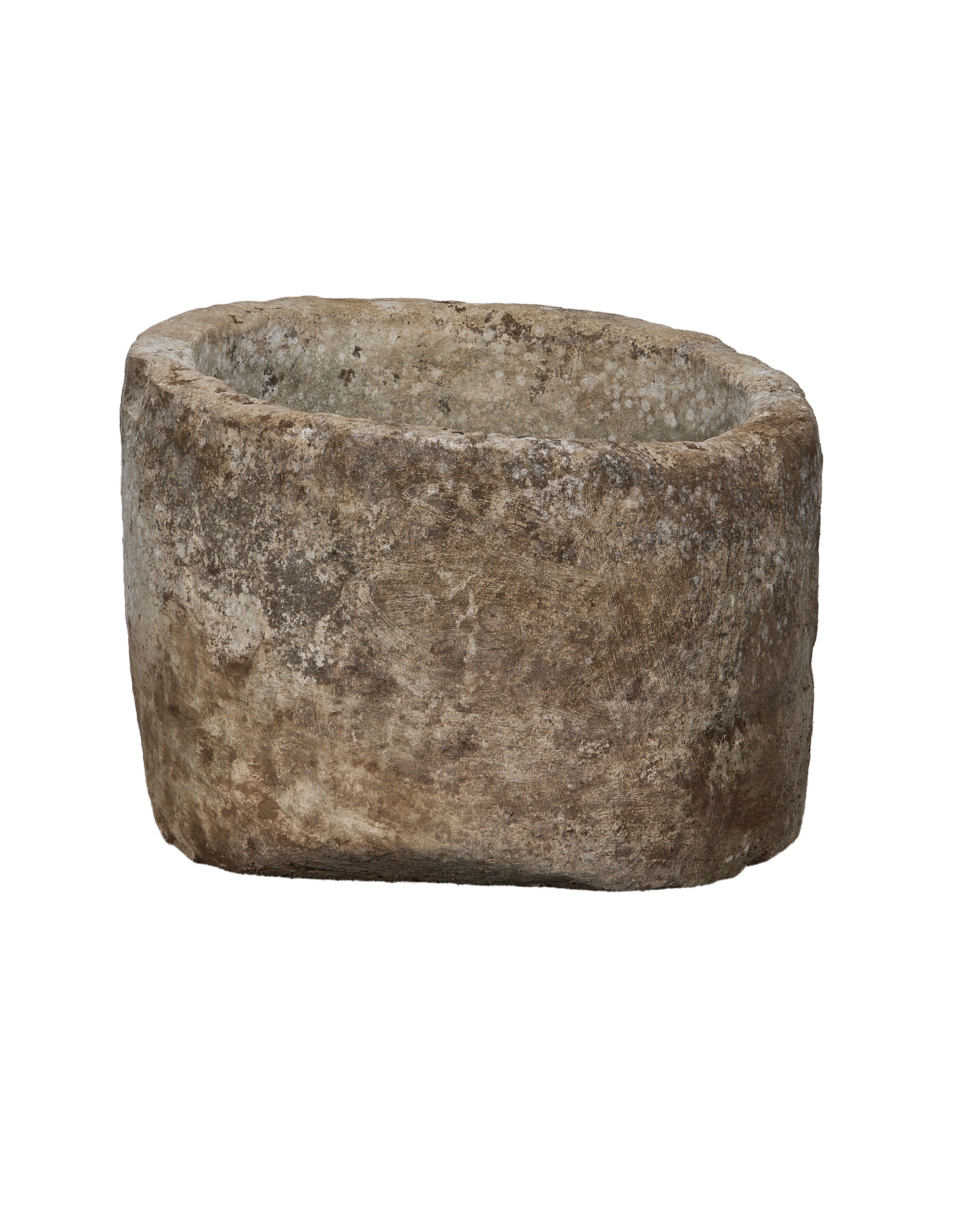 Vintage Indonesian round limestone trough, side profile showcasing textured weathered surface.