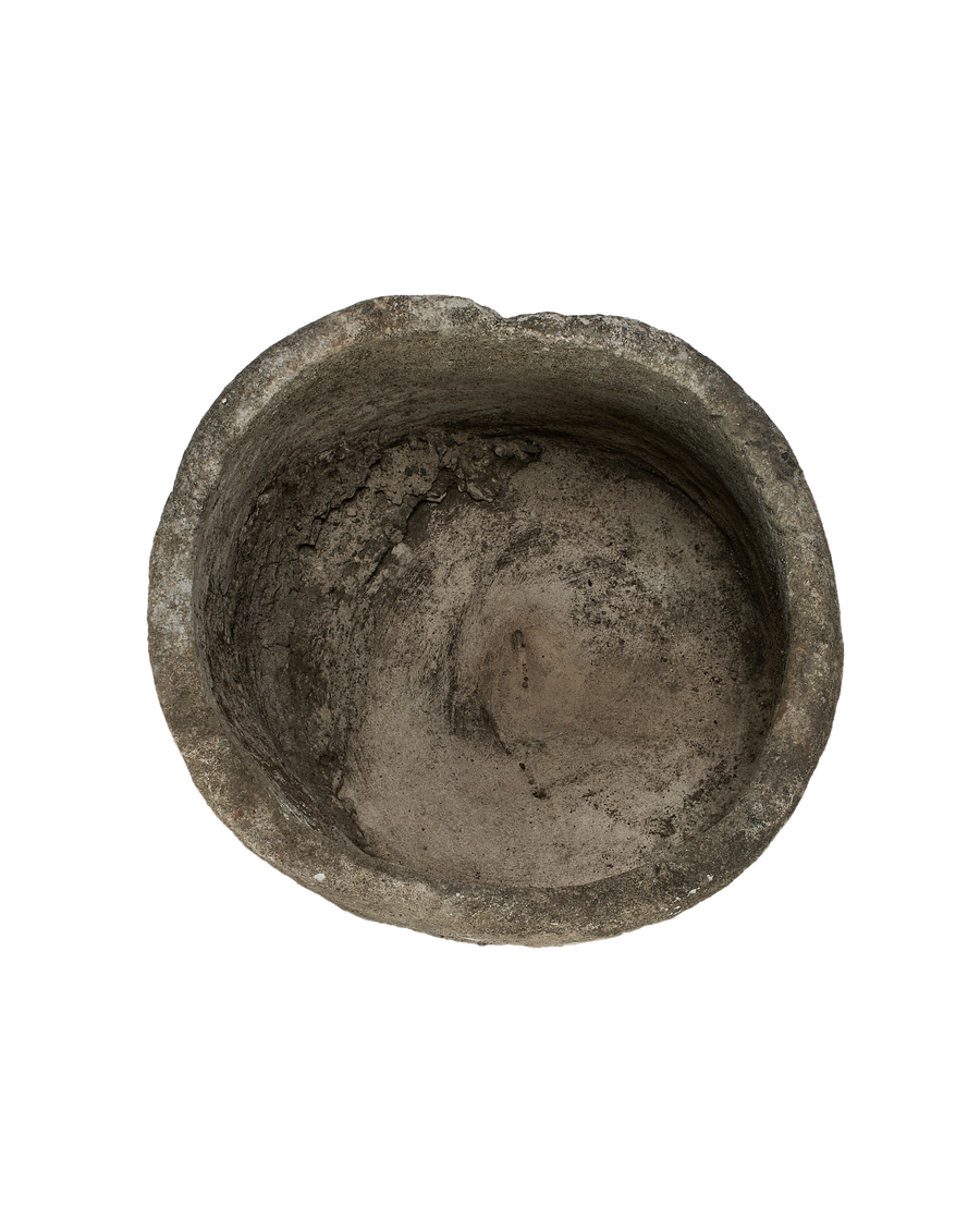 Vintage round Indonesian limestone trough, OAK, detailed view of rough interior texture.