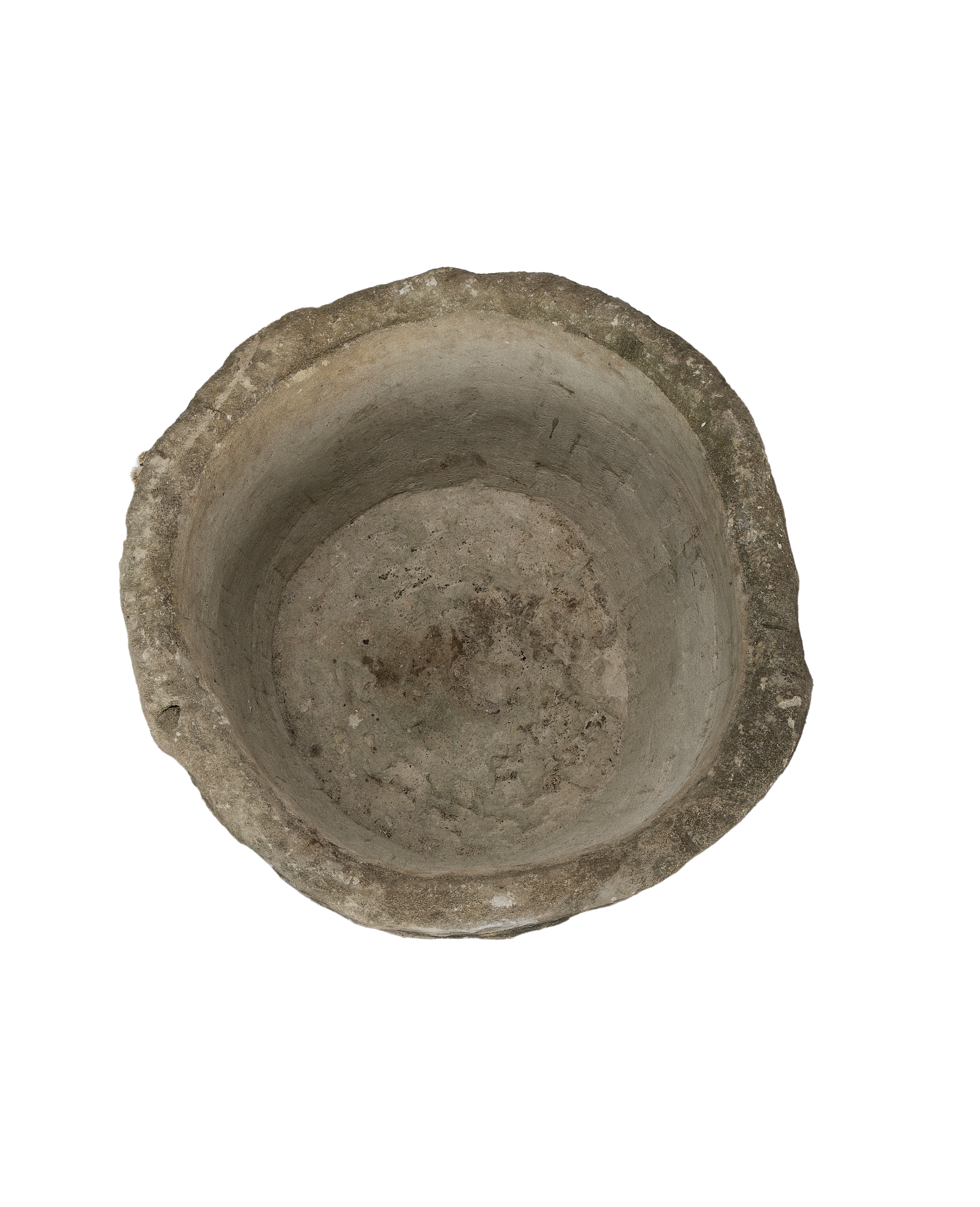 Vintage round Limestone Trough, showing the rough, weathered interior surface from above.