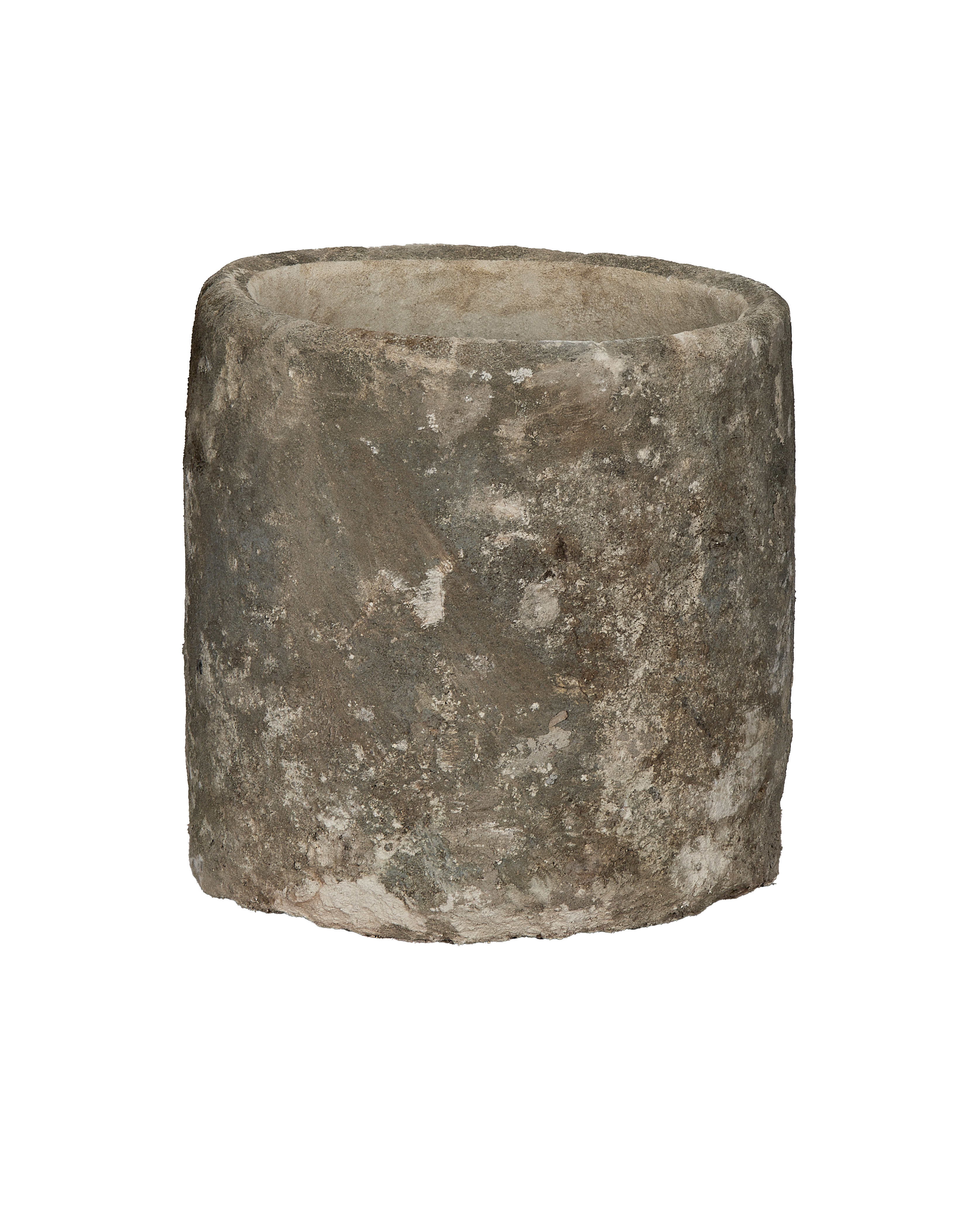 Vintage Indonesian limestone trough, round, showing detailed weathered surface texture, side view.