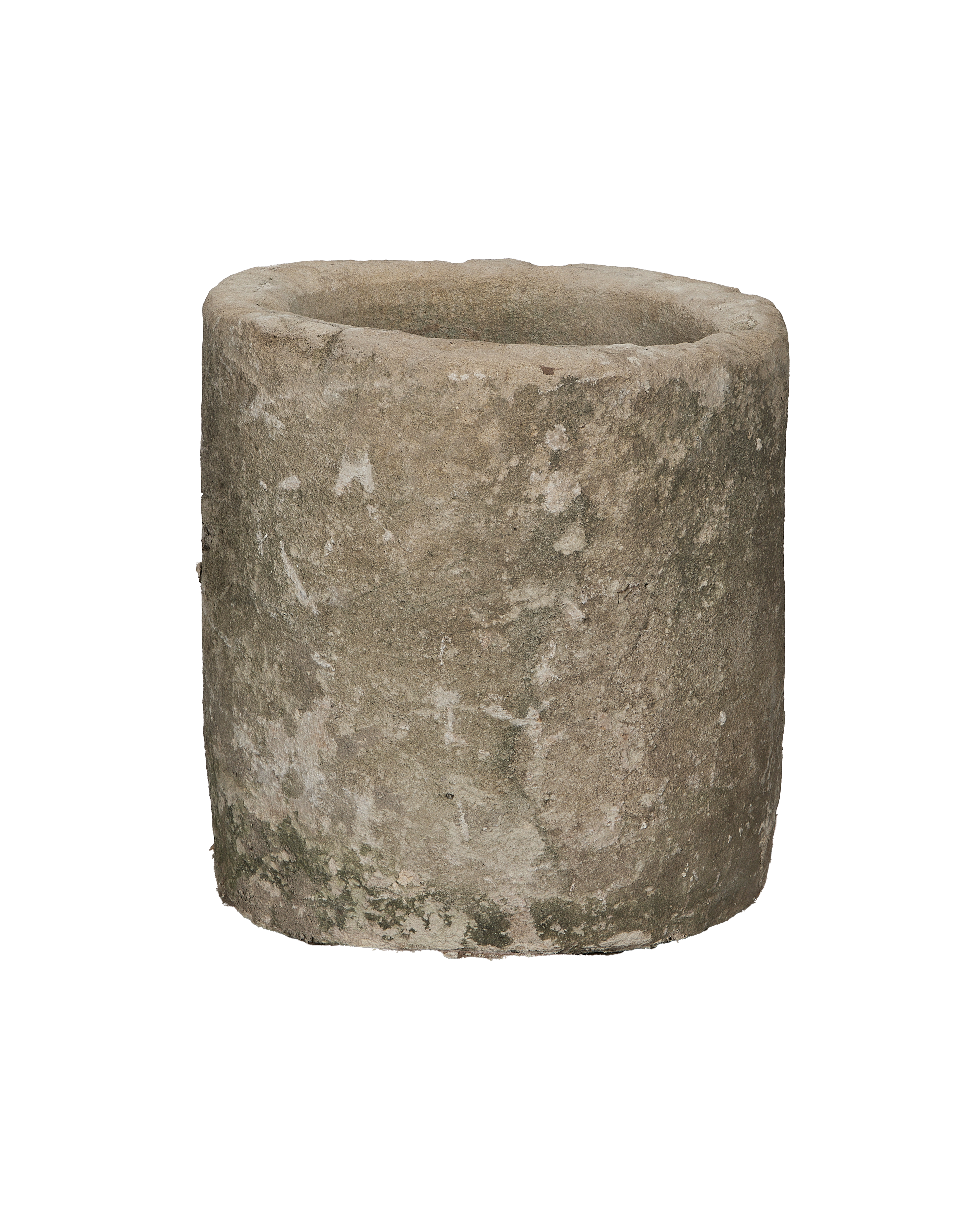 Round vintage Indonesian limestone trough, top-down view showing textured surface with moss.