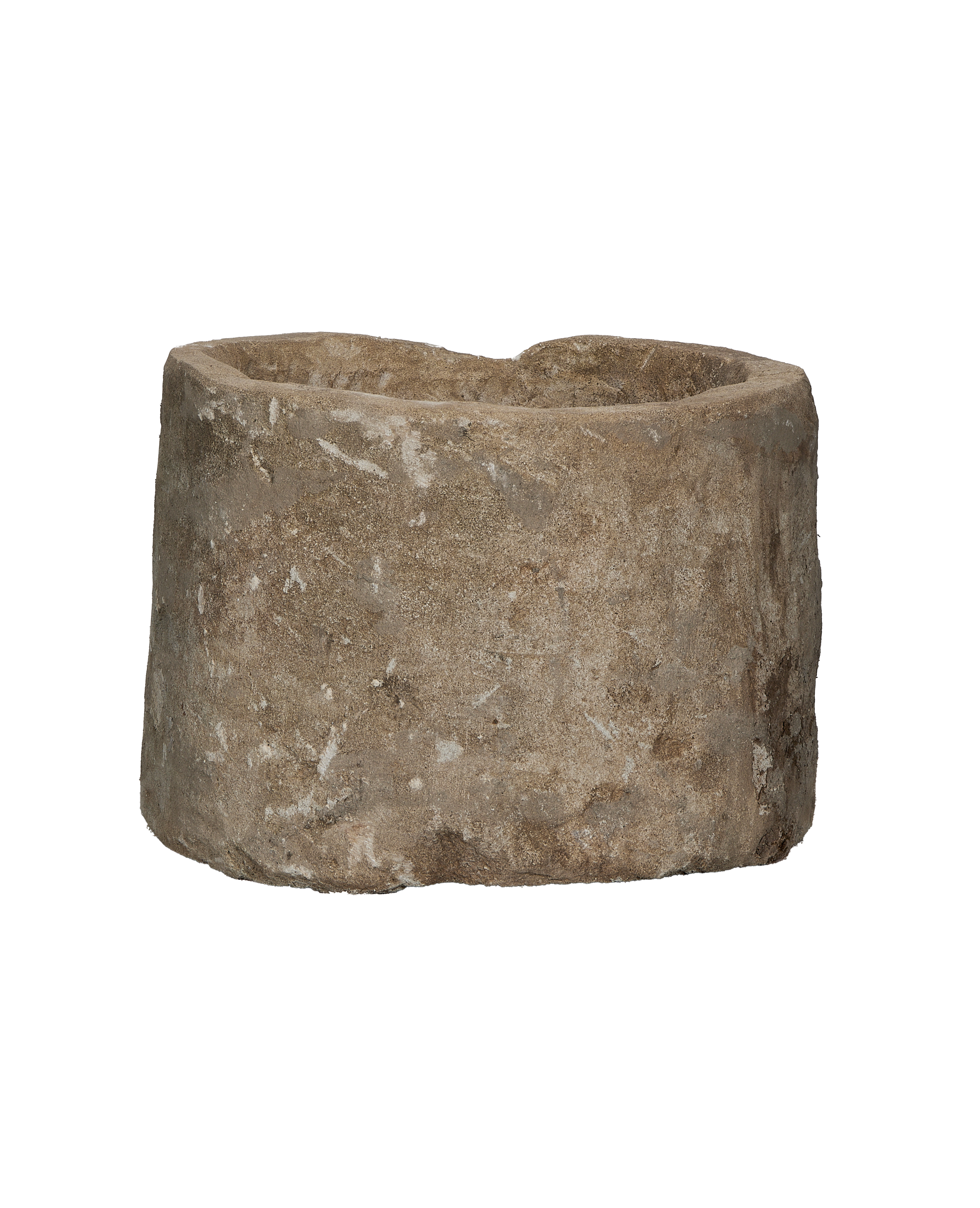 Vintage Indonesian round limestone trough, showing internal and external texture and rough-hewn edges.