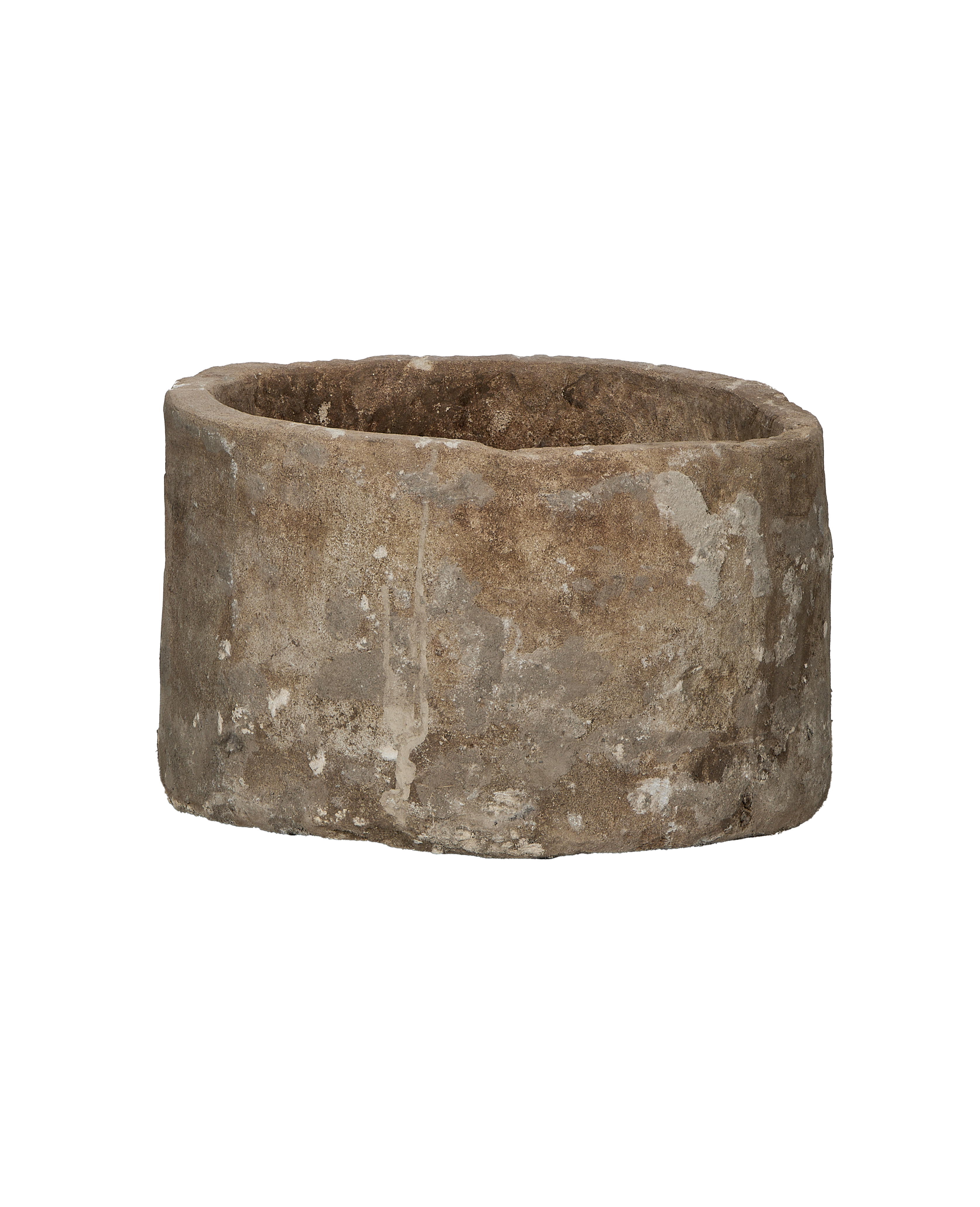 Vintage Indonesian limestone trough, showing textured outer surface and rounded bottom edge.