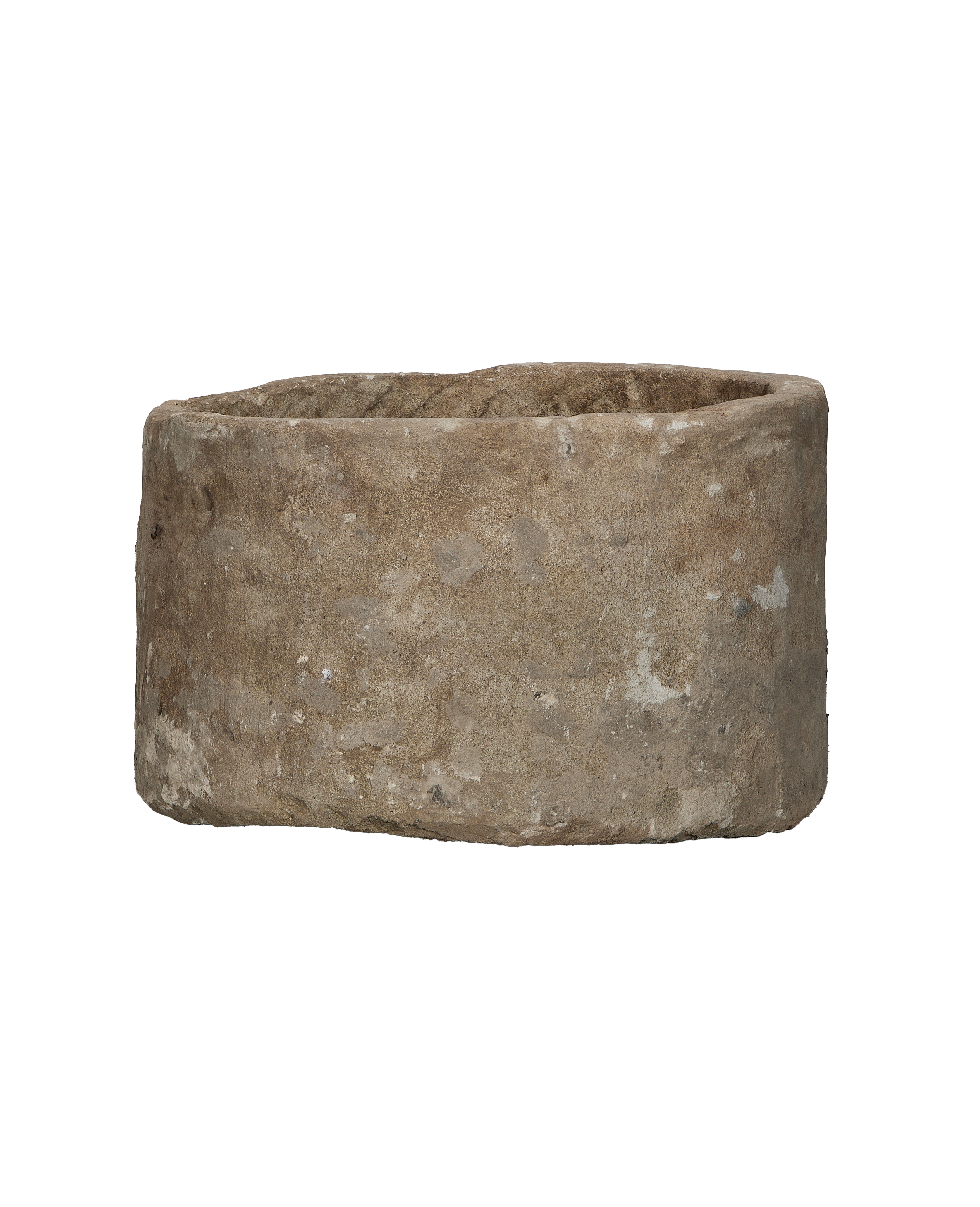 Vintage round limestone trough, full side view, showing weathered texture and imperfections.