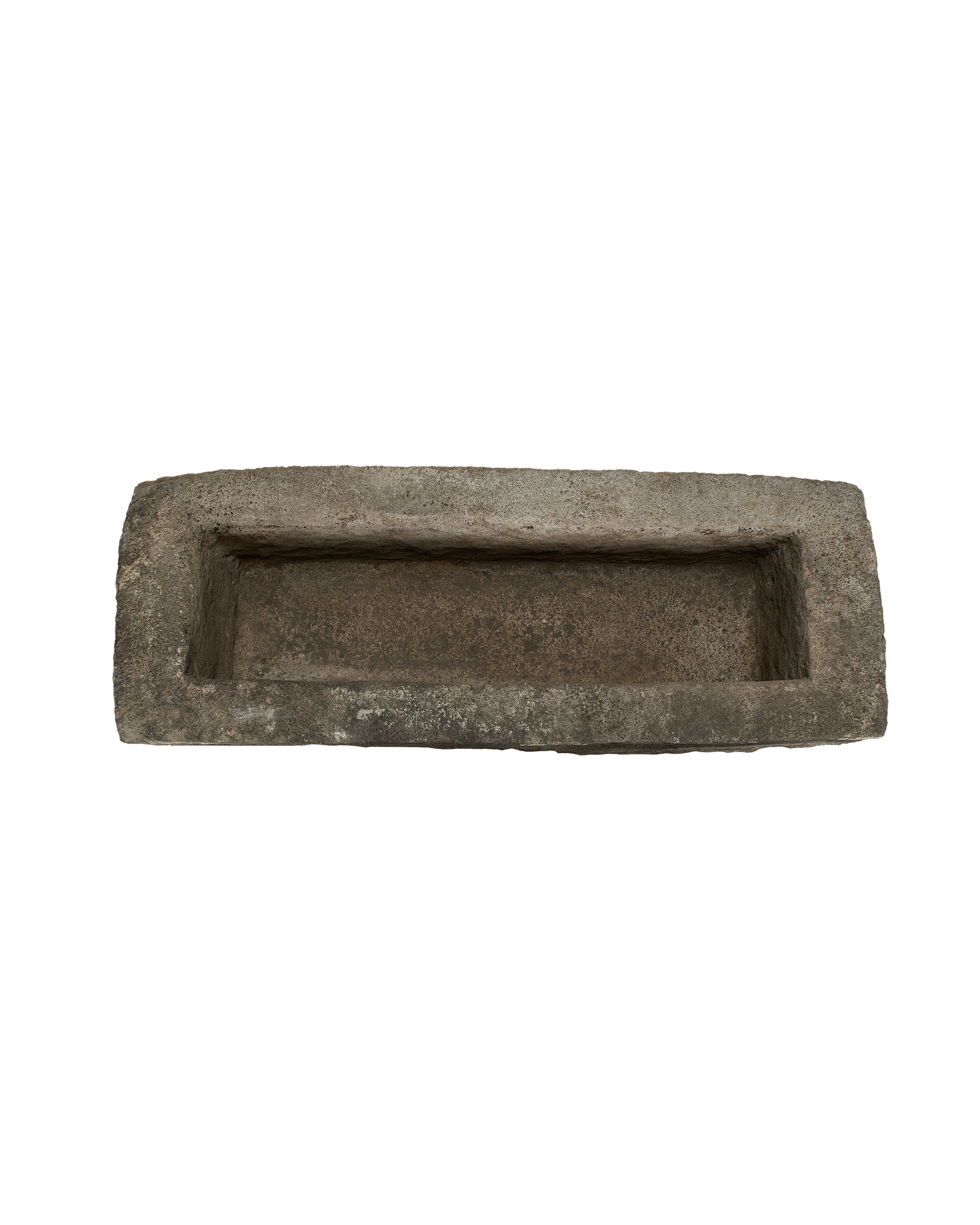 Vintage rectangular limestone trough, top down view revealing weathered, textured rustic interior.