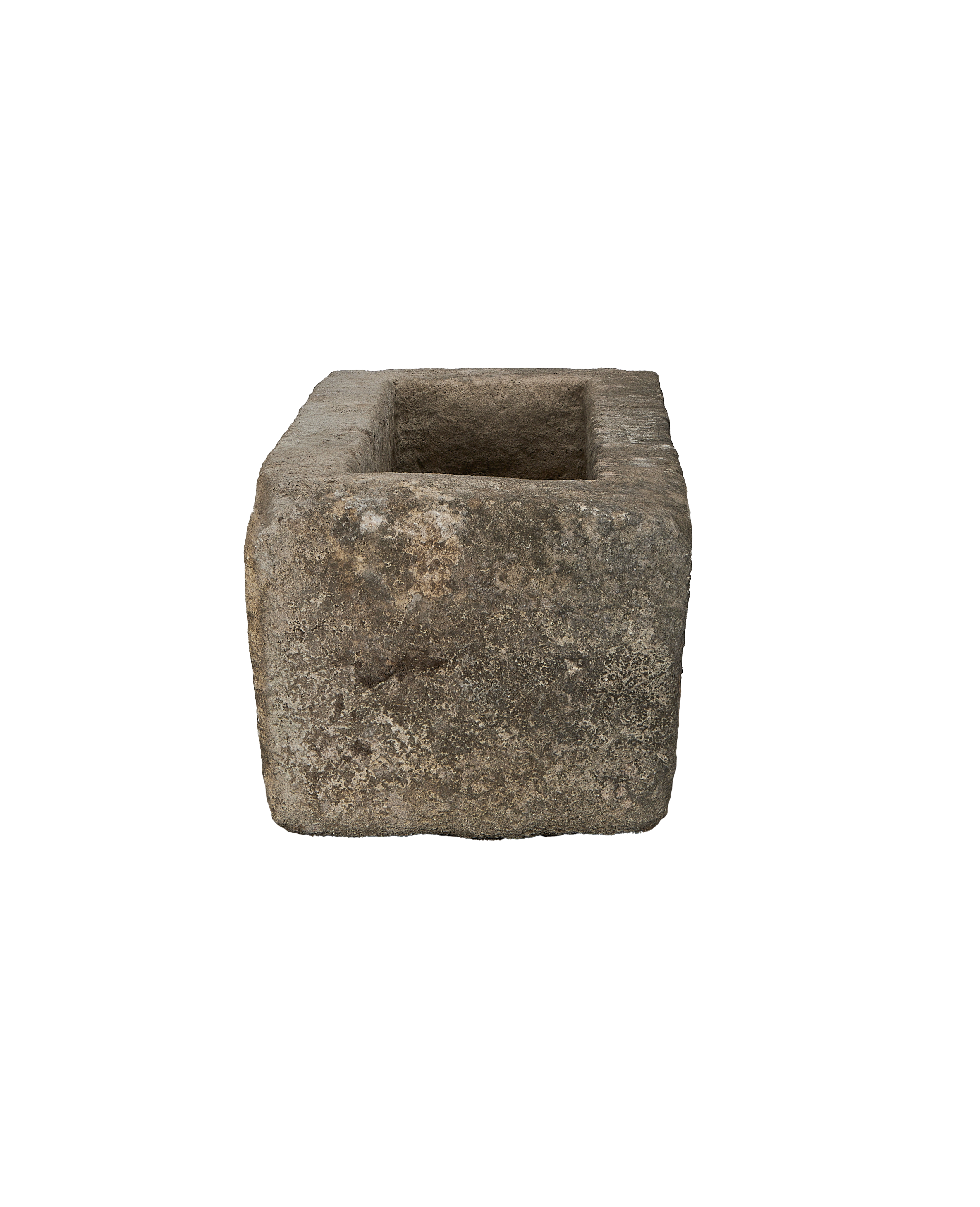 Vintage rectangular limestone trough, close-up revealing aged texture and rustic patina.