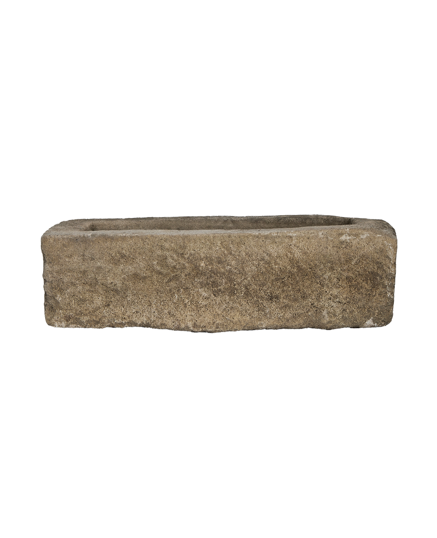 Vintage rectangular Indonesian limestone trough, top-down view showing weathered texture and natural interior.