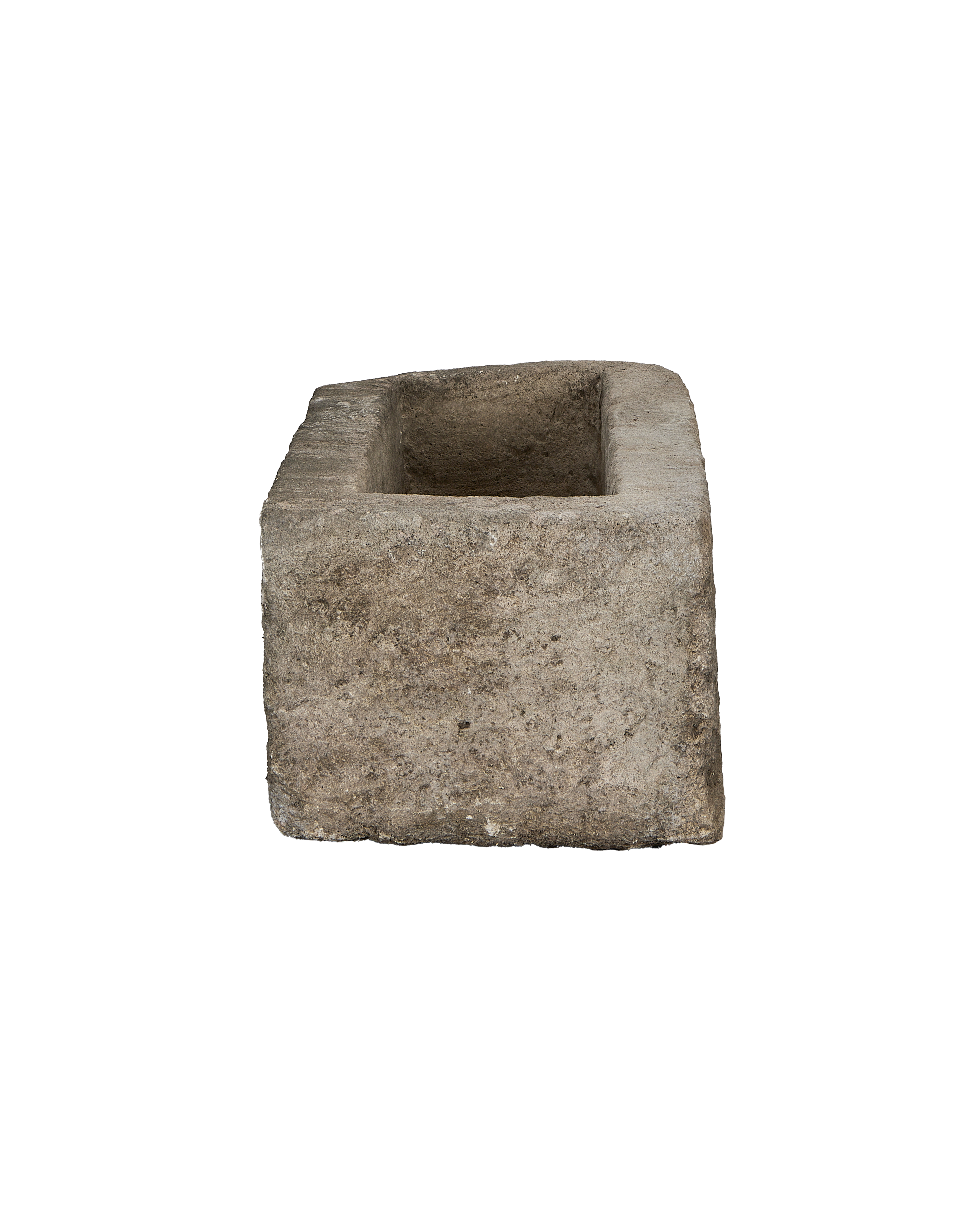 Vintage Indonesian limestone trough closeup, featuring unique rectangular inner surface texture.