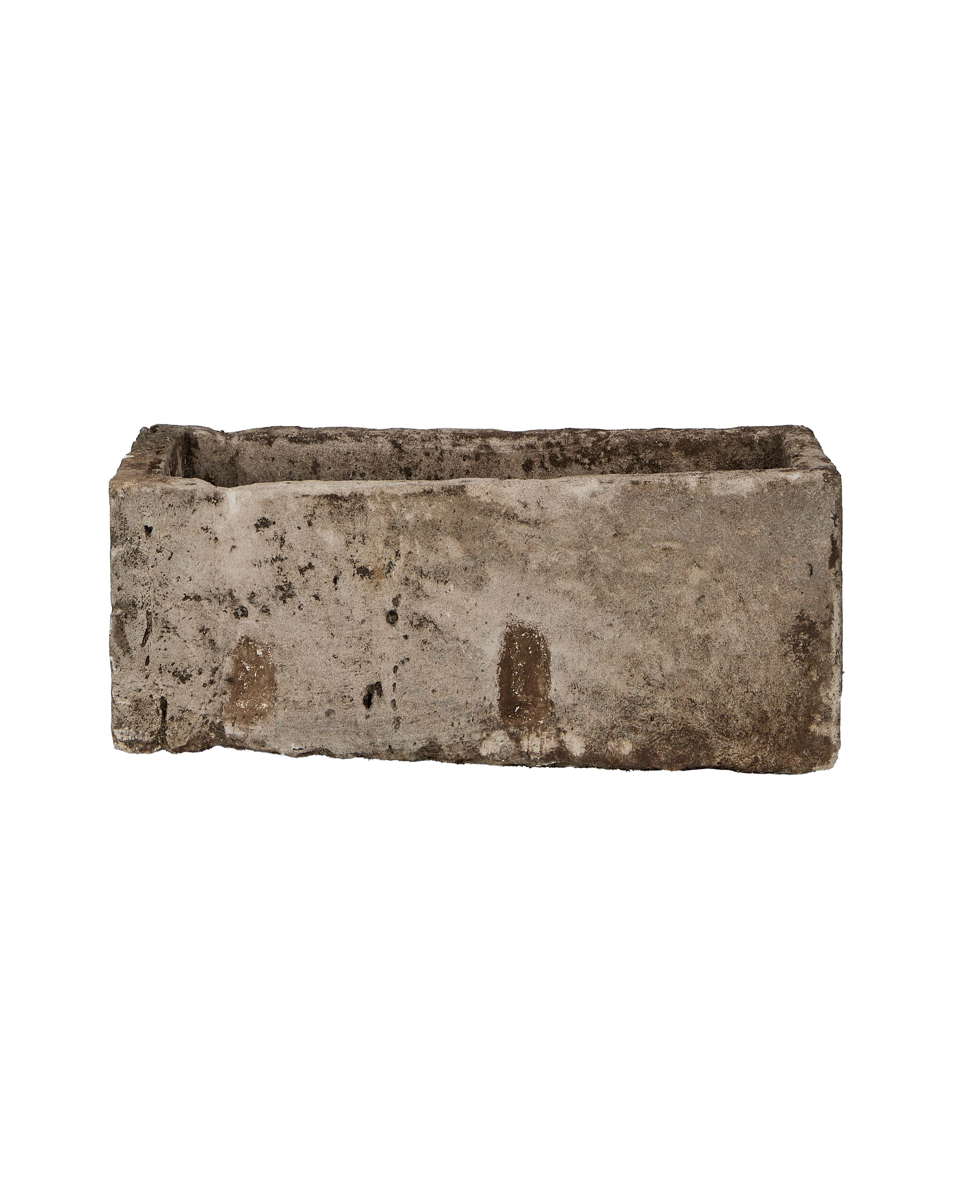 Vintage Indonesian limestone trough, rectangular, with textured, weathered gray surface on black background.