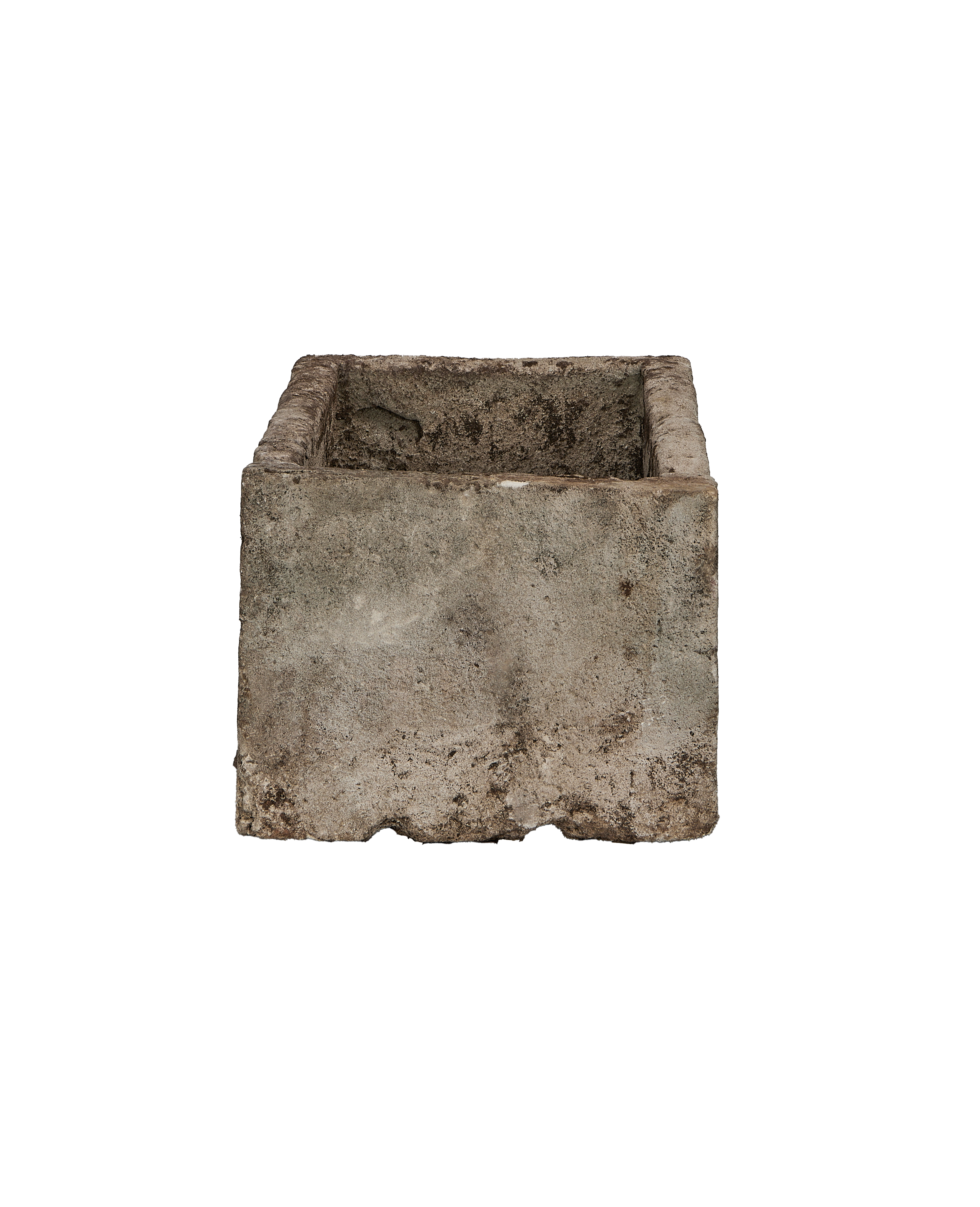 Vintage Indonesian limestone trough viewed from the side, showing rough texture and weathered finish.