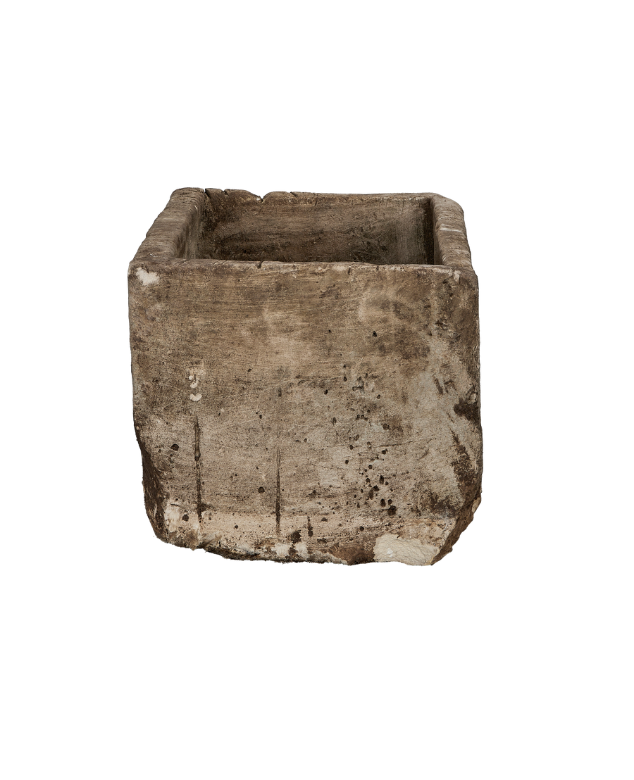 Vintage Indonesian oak limestone trough, weathered finish, shown from unique low-angle revealing textured surface.