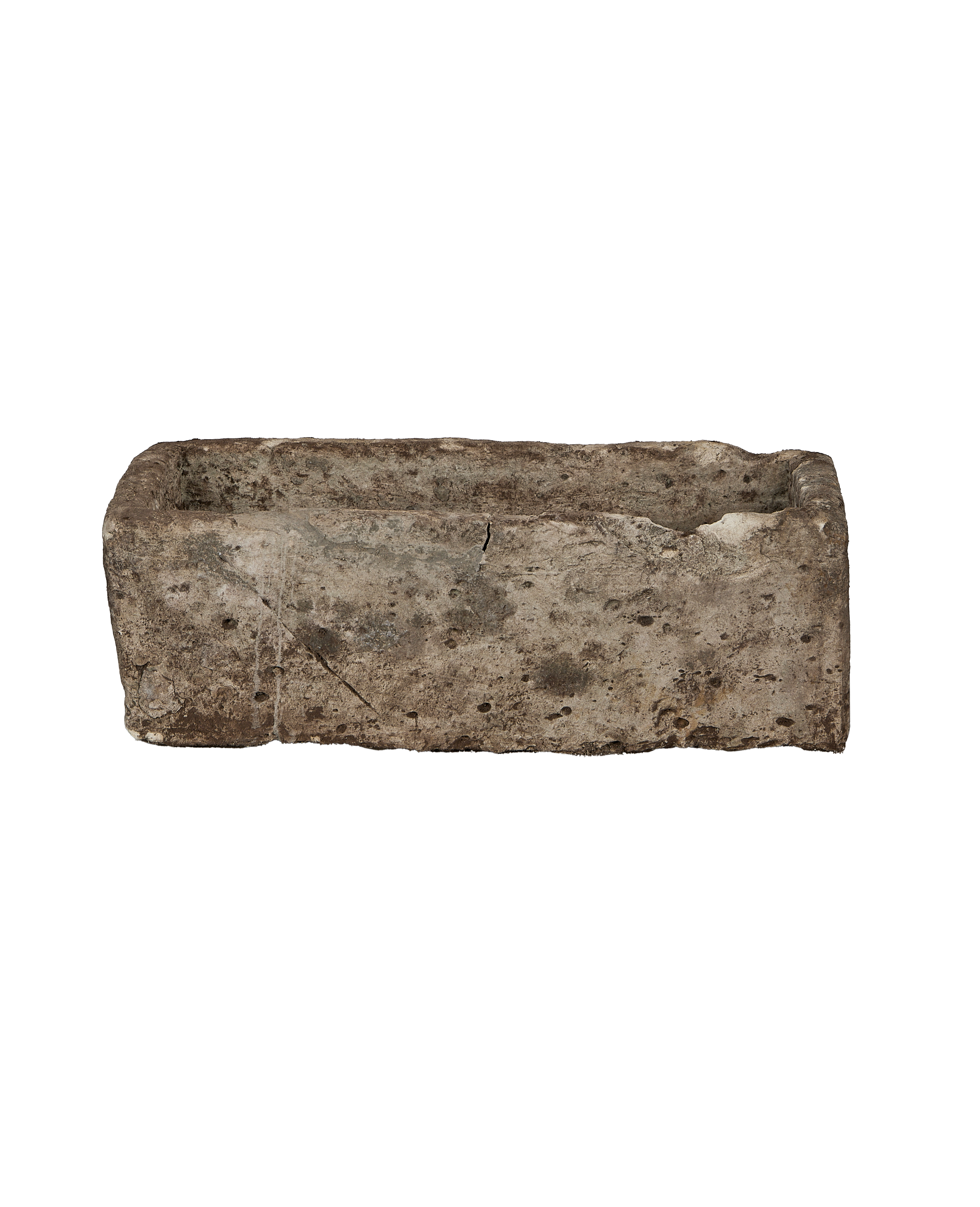 Vintage Indonesian rectangular limestone trough, showing weathered texture, cracks, and rustic charm.
