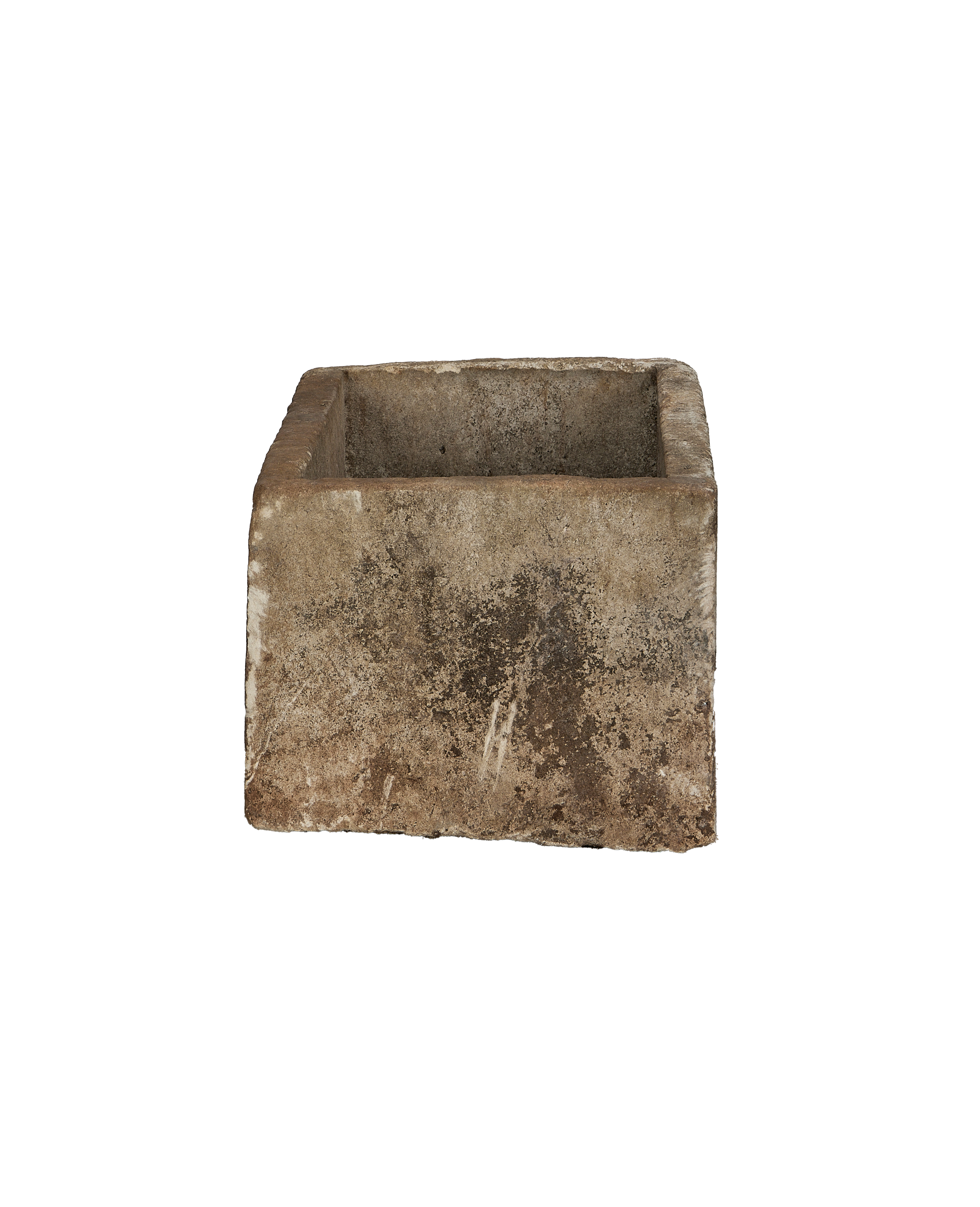 Vintage Indonesian limestone trough, displaying a textured exterior and weathered condition from an elevated angle.